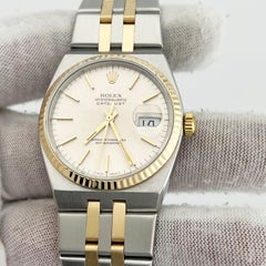 Rolex Datejust Oysterquartz 17013 Esfera plateada Oro amarillo de 18 quilates Caja de acero Papel