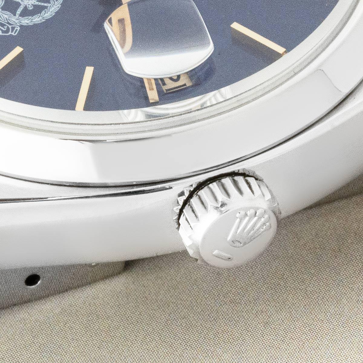 A 36mm Datejust Oysterquartz in stainless steel by Rolex. Featuring a blue dial with a purple hue that features the logo of the Royal Omani Police, and applied hour markers. The watch is fitted with sapphire glass, a quartz movement, and an