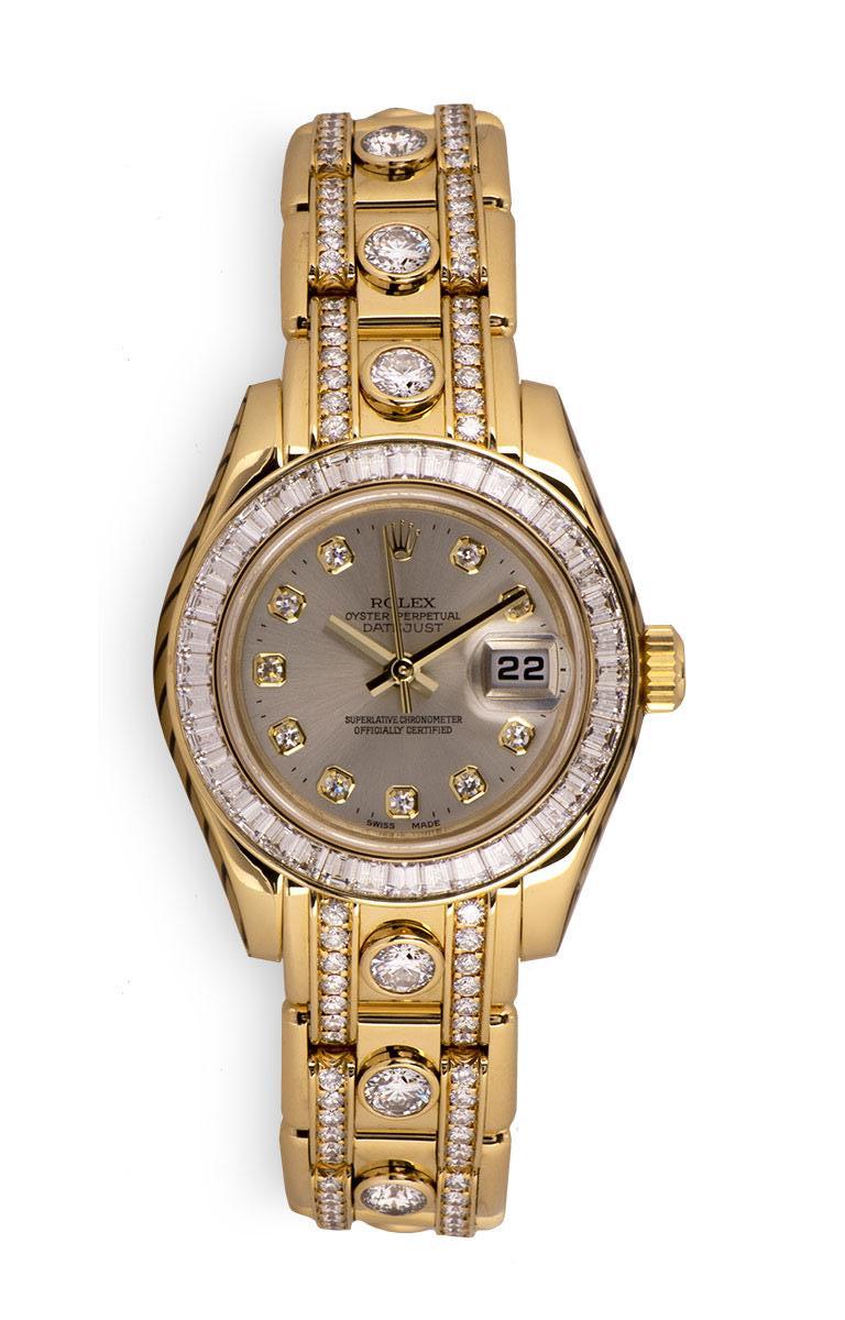 A 29 mm 18k Yellow Gold Oyster Perpetual Datejust Pearlmaster Ladies Wristwatch, silver dial set with 10 applied round brilliant cut diamond hour markers, date at 3 0'clock, a fixed 18k yellow gold bezel set with 40 baguette cut diamonds, an 18k