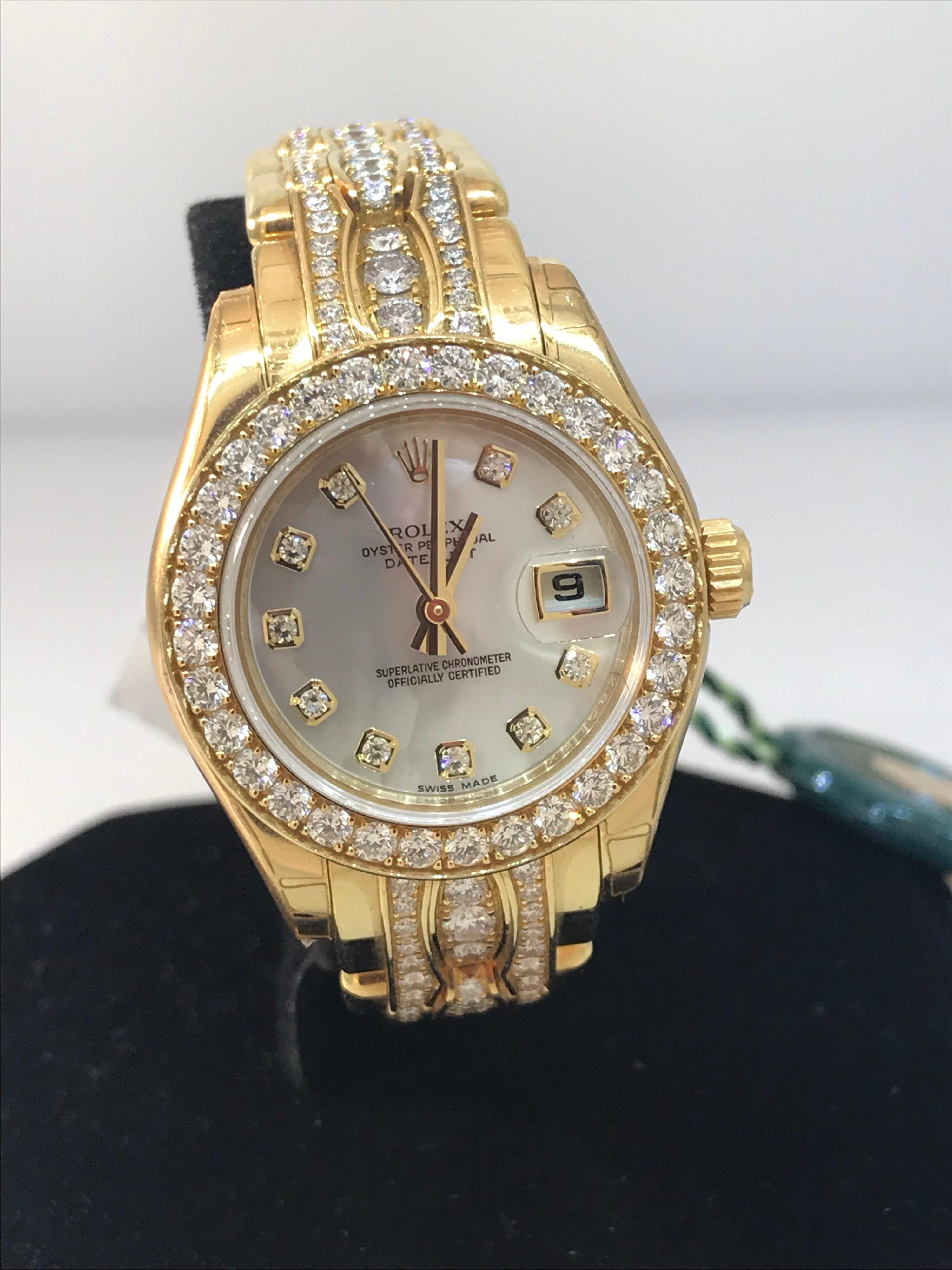 Rolex Datejust Pearlmaster Ladies Watch

Model Number 80298-74978BR

100% Authentic

Brand New / Old Stock

Comes with original Rolex Box, warranty card and instruction manual

18 Karat Yellow Gold Case & Bracelet

Diamond Bezel and Lugs

Mother of