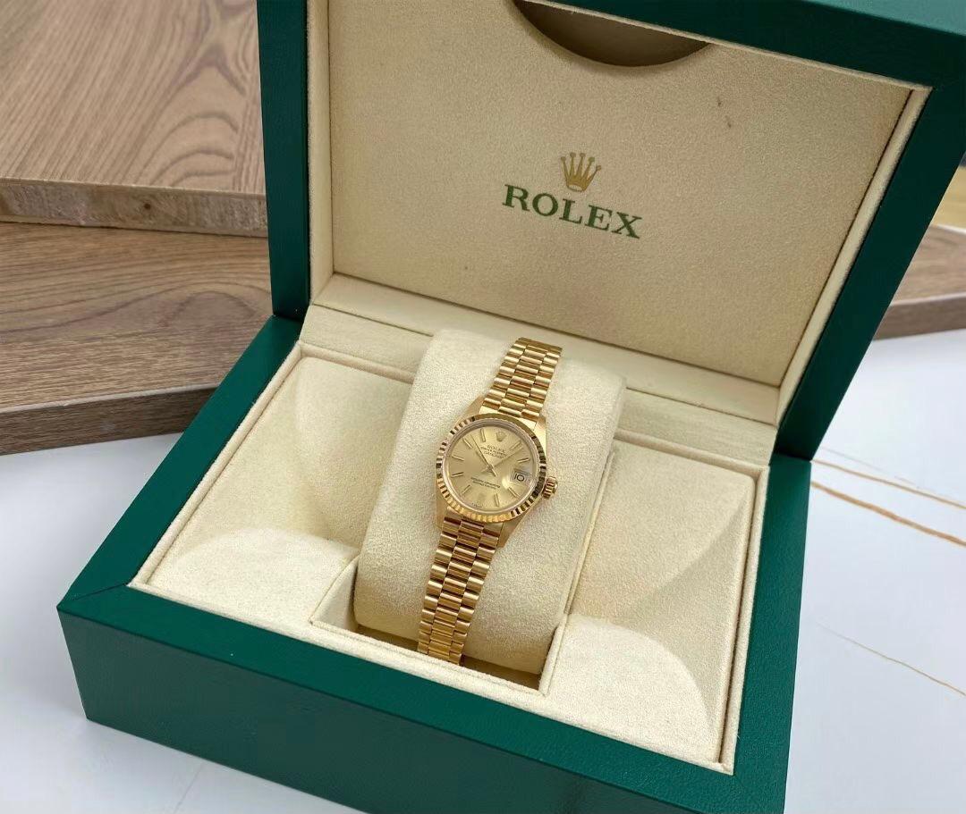 Ladies Rolex Datejust Ref 6917 26mm 18ct yellow gold case with white roman numeral dial. Presented on an 18k yellow gold bracelet and powered by an automatic movement. Comes with box.

With A Suggested Retail Price Of £15000

Movement