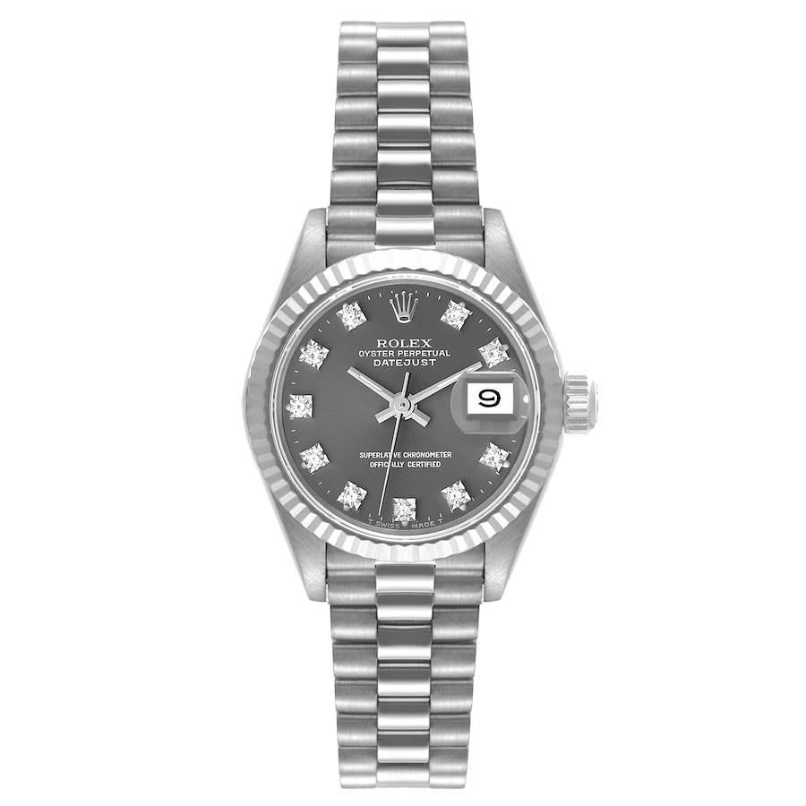 Rolex Datejust President 26 White Gold Slate Diamond Dial Ladies Watch 69179. Officially certified chronometer automatic self-winding movement. 18k white gold oyster case 26.0 mm in diameter. Rolex logo on the crown. 18K white gold fluted bezel.