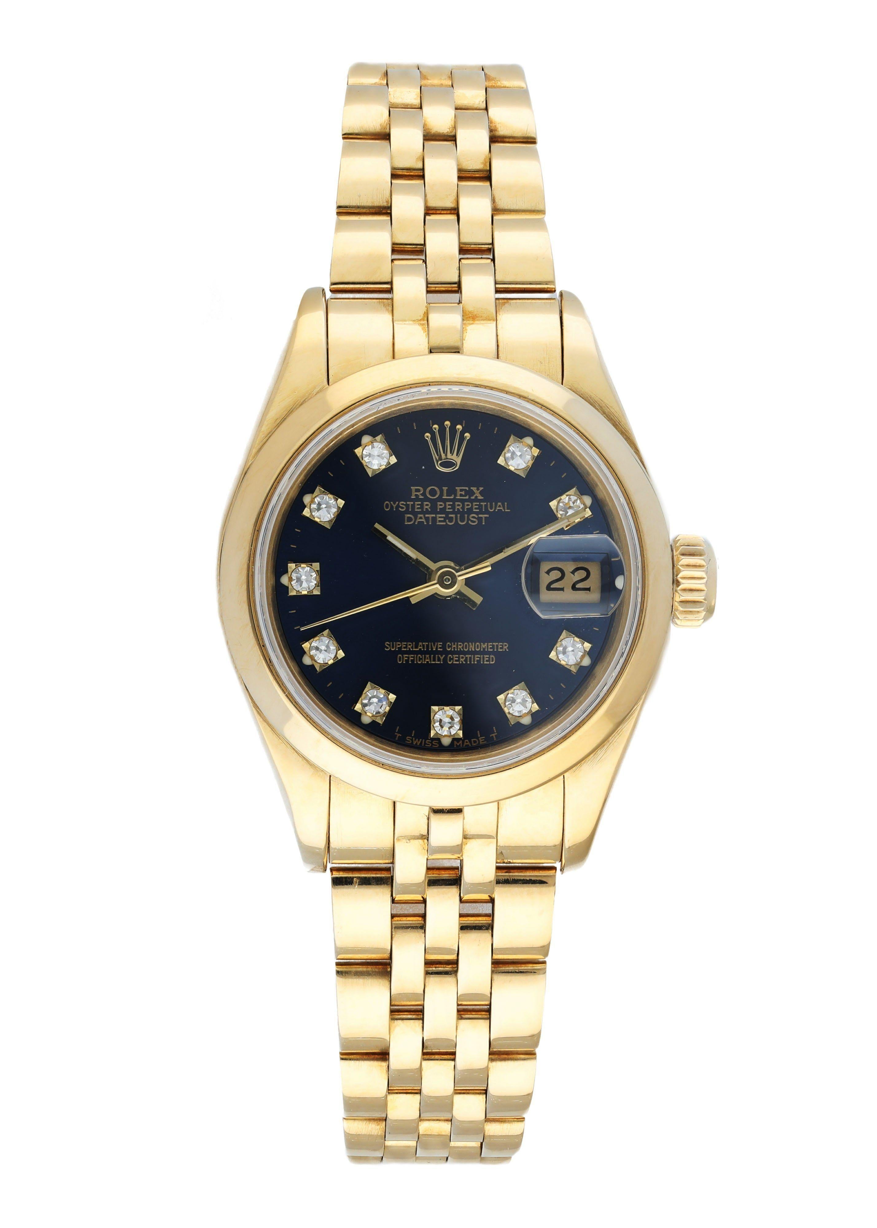 Rolex Datejust 69168 Ladies Watch. 
26mm 18k Yellow Gold case. 
Yellow Gold smooth bezel. 
Blue dial with gold hands and factory set diamond hour markers. 
Minute markers on the outer dial. 
Date display at the 3 o'clock position. 
Yellow Gold