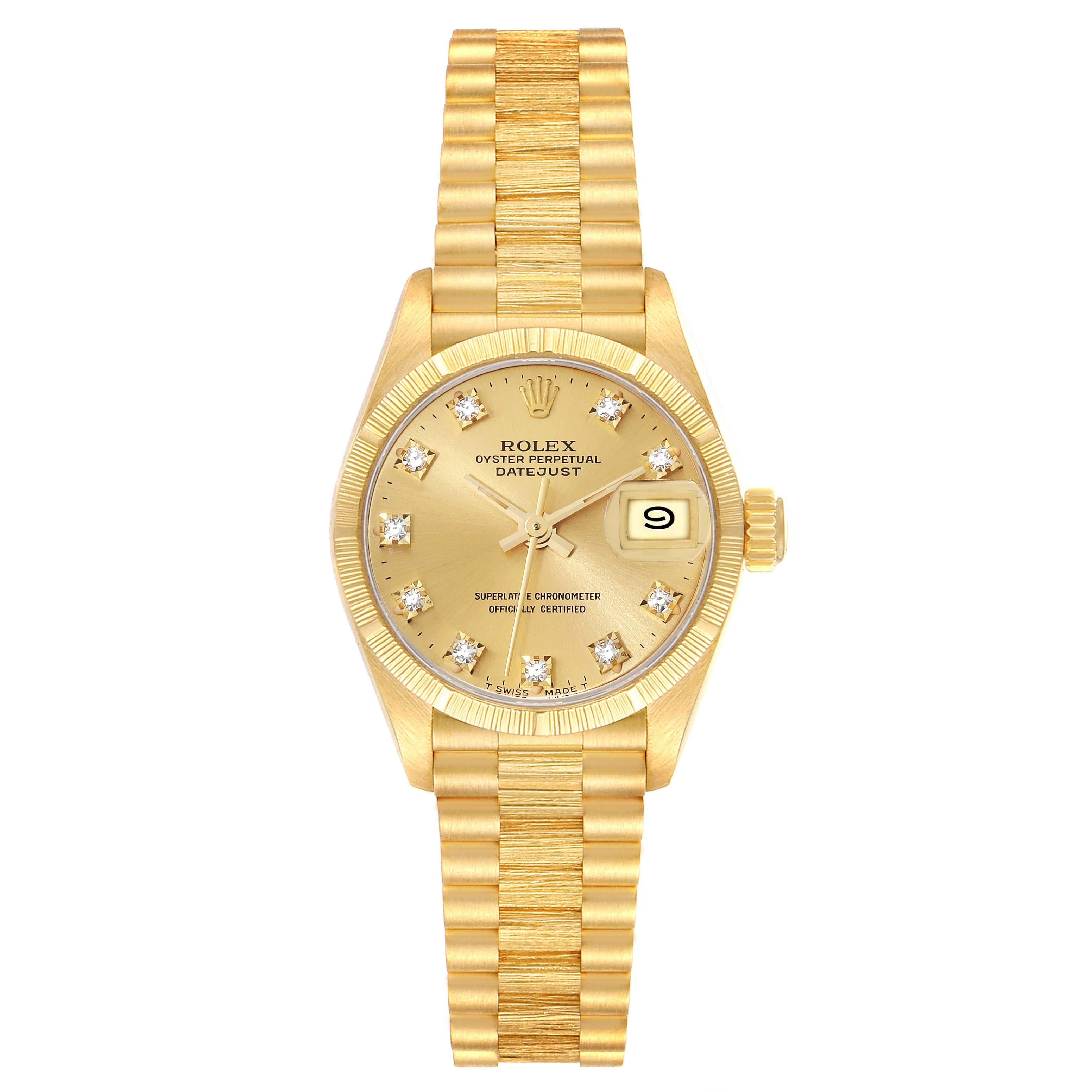 Rolex Datejust President Diamond Dial Yellow Gold Bark Finish Ladies Watch 69278. Mouvement à remontage automatique certifié chronomètre. Boîtier en or jaune 18 carats d'un diamètre de 26,0 mm. Logo Rolex sur la couronne. Lunette en or jaune 18k