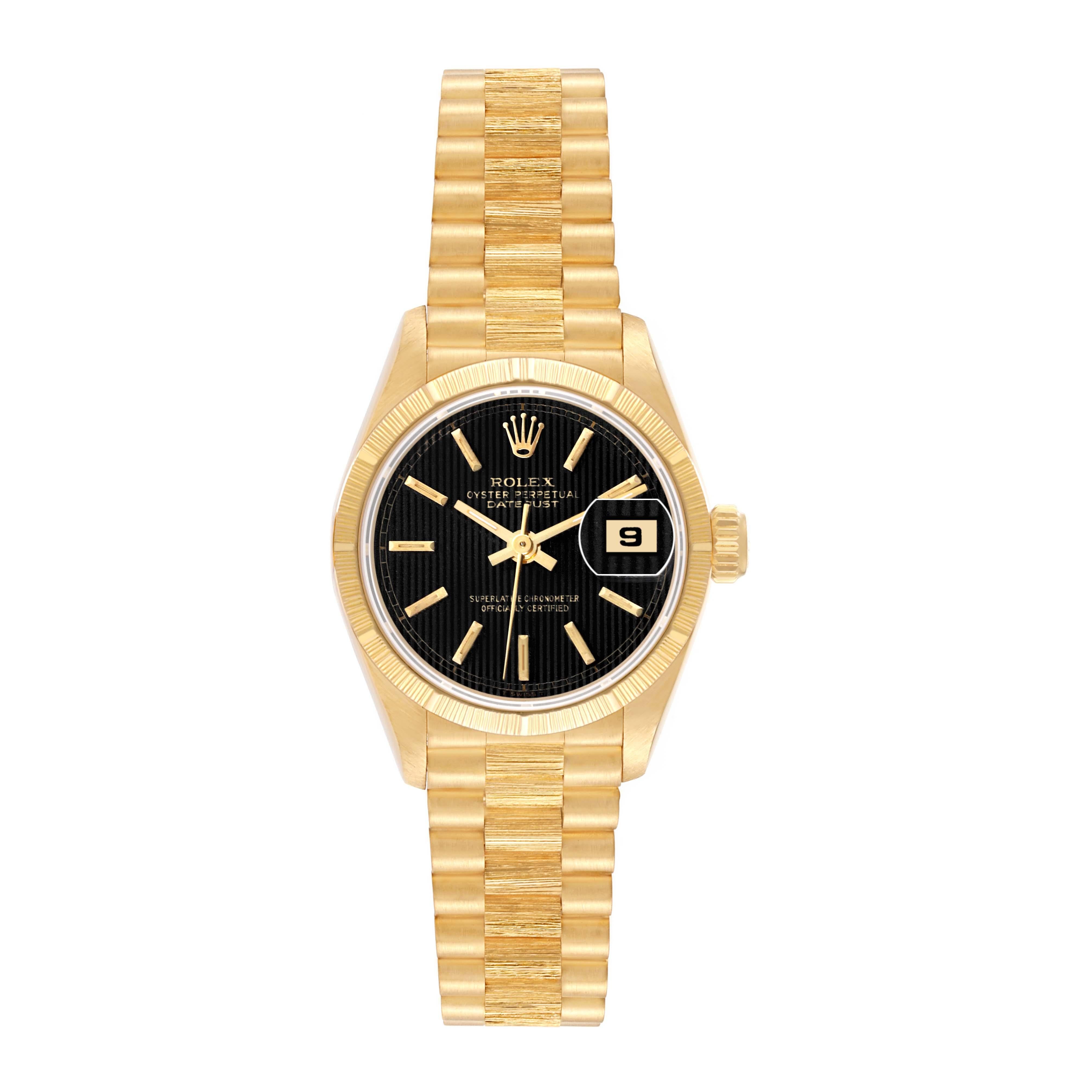 Rolex Datejust President Yellow Gold Bark Finish Ladies Watch 69278 Box Papers. Officially certified chronometer automatic self-winding movement. 18k yellow gold oyster case 26.0 mm in diameter. Rolex logo on the crown. 18k yellow gold engine turned