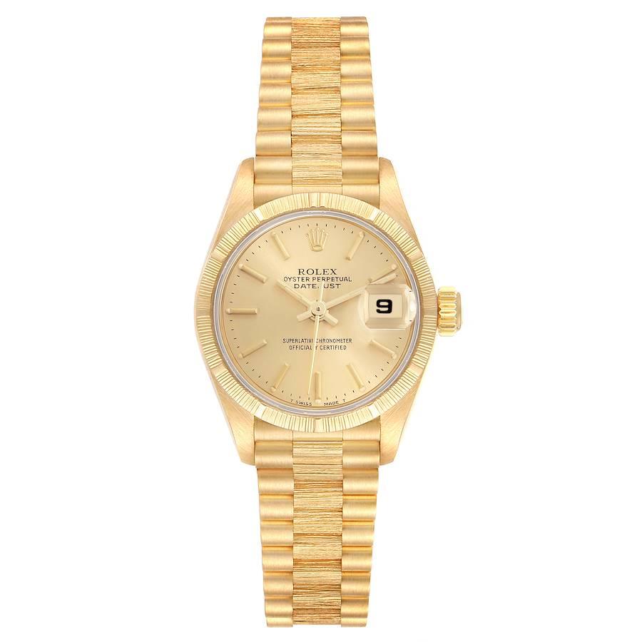 Rolex Datejust President Yellow Gold Bark Finish Ladies Watch 69278. Officially certified chronometer automatic self-winding movement. 18k yellow gold oyster case 26.0 mm in diameter. Rolex logo on the crown. 18k yellow gold engine turned bezel with