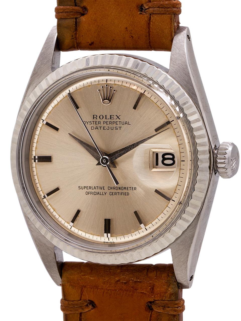 
Beautiful condition example early Rolex stainless steel Datejust ref# 1601 serial# 945,xxx circa 1962. Featuring a 36mm diameter Oyster case with finely milled 14K white gold fluted bezel, acrylic crystal, and original silver satin dial, with early