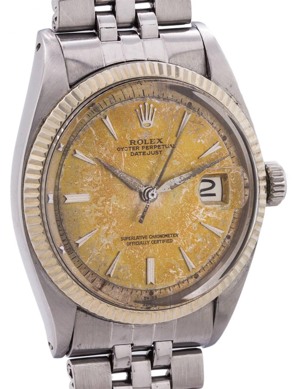 
Rolex Stainless Steel Datejust ref 1601 serial # 8.8 million circa 1963. Full size man’s 36mm diameter case with 14K white gold fluted bezel and acrylic crystal with a richly patina’d “harvest gold” tropical dial tapered and faceted indexes and