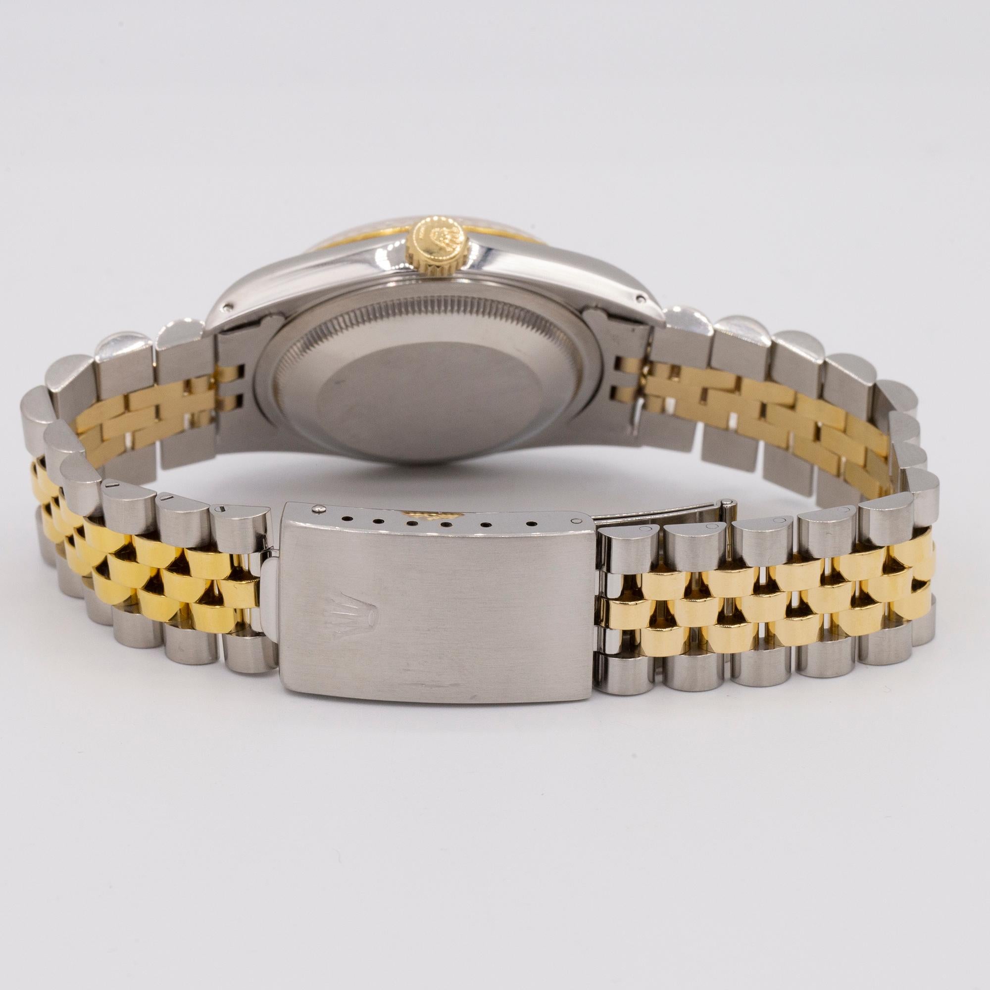 This timepiece has been fully overhauled by our master watchmakers and comes with a 1 year warranty.

Brand: Rolex
Model: Datejust
Reference: 16233
Year: 1991
Material: 18kt Yellow Gold & Stainless Steel
Size: 36mm
Crystal: Sapphire
Bracelet: 18kt