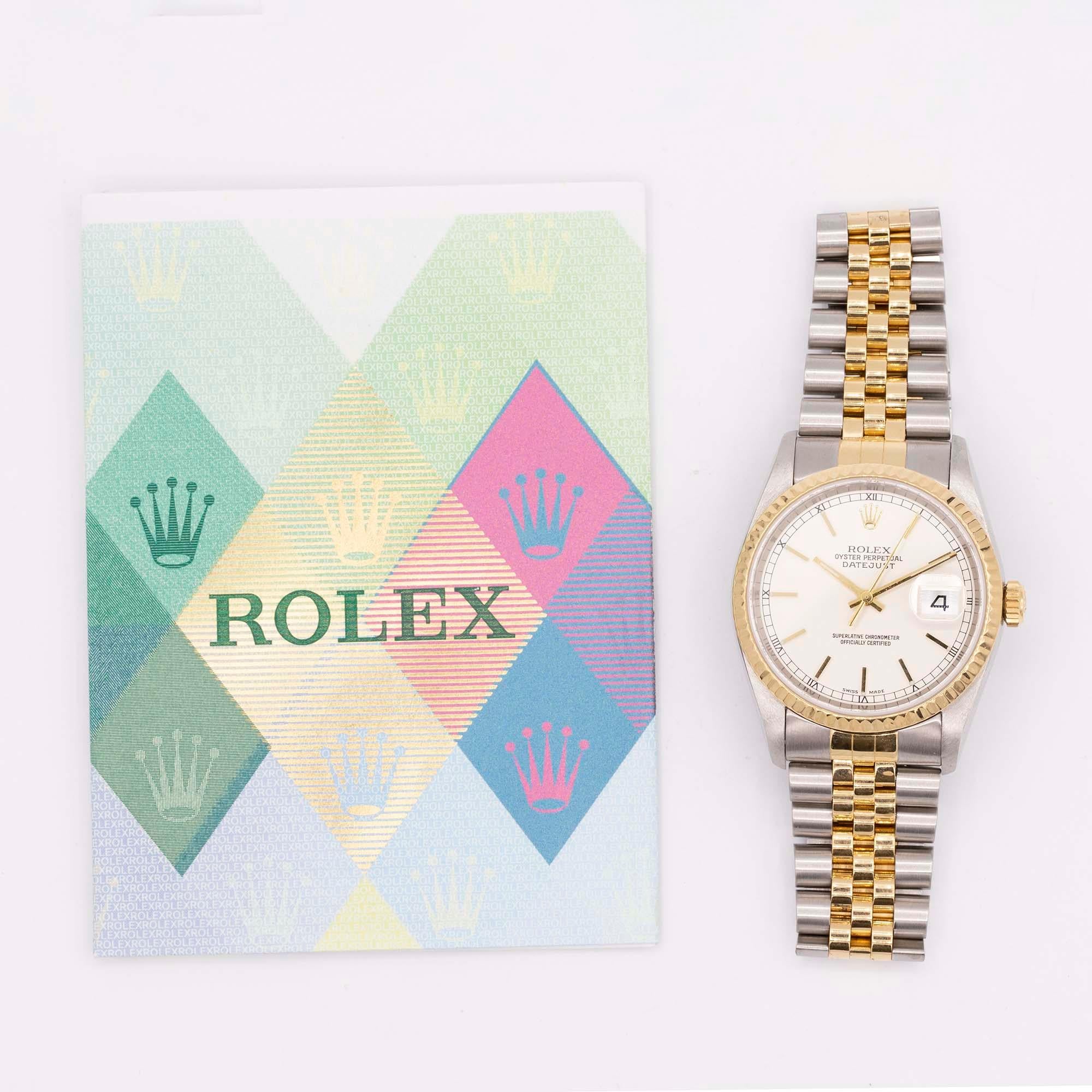 Vintage Stainless Steel & 18 karat yellow gold Rolex Datejust. Size 36mm. This Rolex has a silver dial and a fluted yellow gold bezel. This Rolex is housed on a Jubilee bracelet. The reference # is 16233 and the serial starts with a Y. Comes with