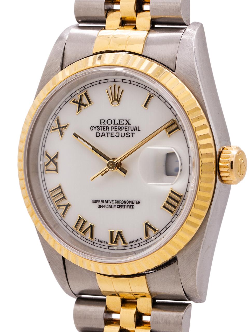 
Man’s Rolex Datejust ref 16233, in stainless steel and 18K yellow gold. Serial# W, circa 1995. Featuring 36mm diameter case with 18K yellow gold fluted bezel, sapphire crystal, and beautiful eggshell Roman dial. Powered by calibre 3135 self winding