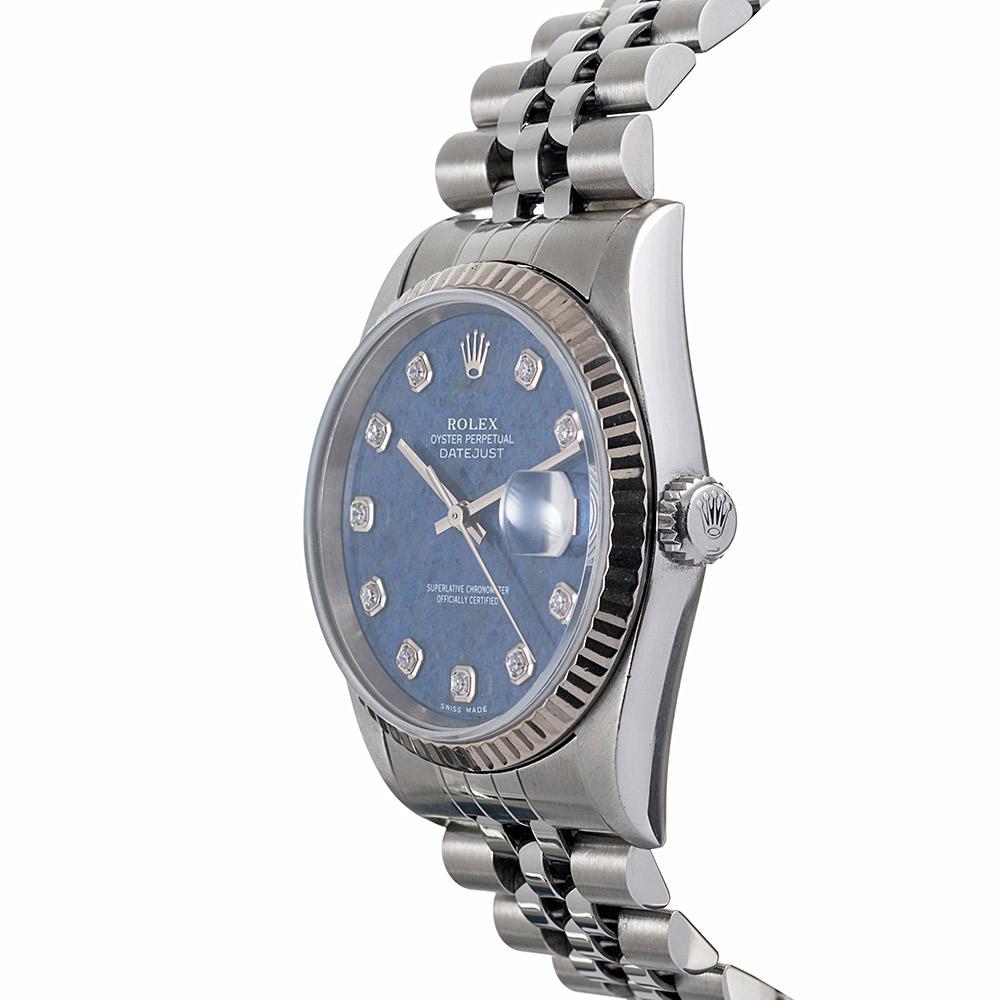 Sodalite is a natural stone with a textured blue hue lighter than lapis lazuli. His denim-like color looks well with any palette and is both distinctive and uncommon. This classic Datejust remains in excellent condition with all original components,