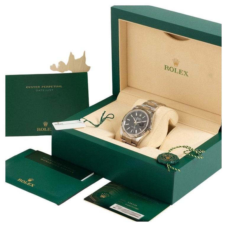Montre-bracelet Rolex Datejust Ref 126334, lunette en or blanc, cadran en  bâton noir. En vente sur 1stDibs