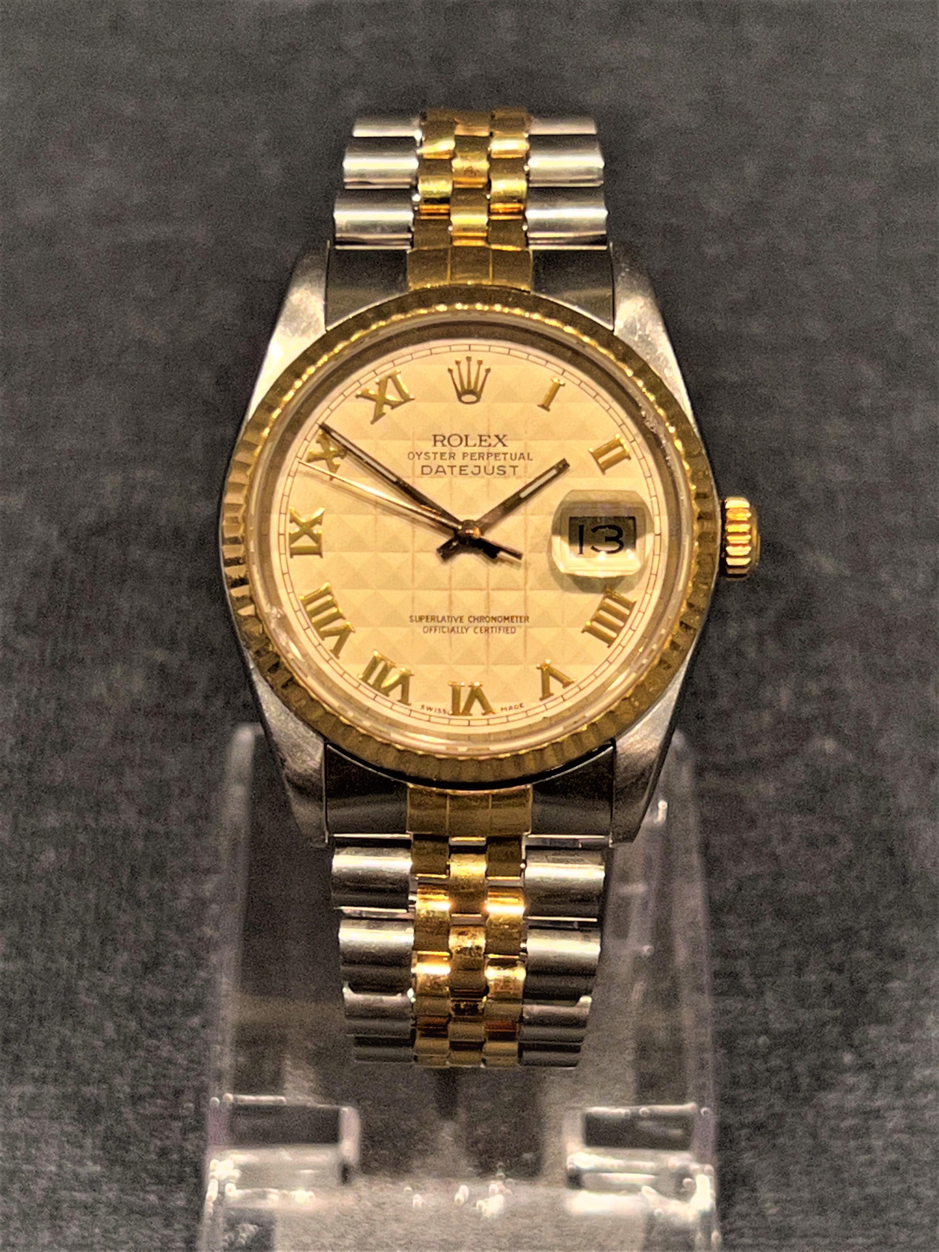 Brand: Rolex
Type: Wristwatch
Model Name: Datejust Roman Pyramid Dial
Model Number: 16233
Serial Number: R619XXX
Lug to Lug (mm): 43.5
Case to Case (mm): 36
Bezel Material: 18K Yellow Gold
Case Material: Stainless Steel
Caseback Material: Stainless
