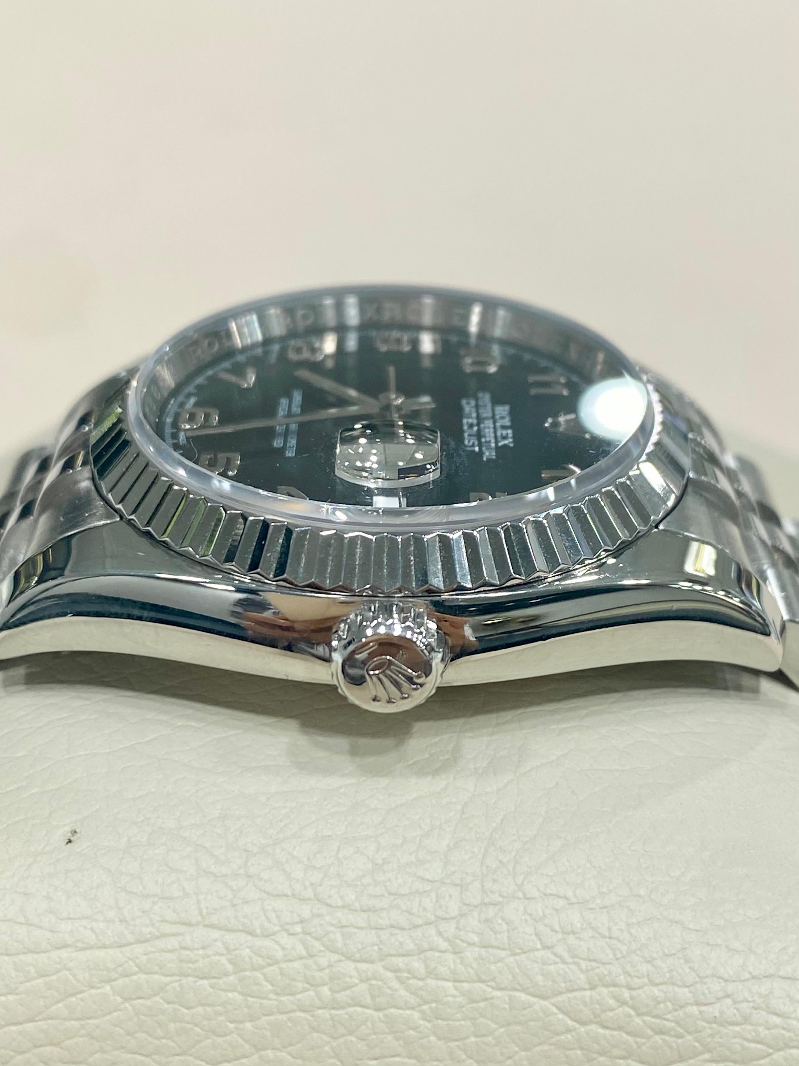Rolex Datejust Roulette Schwarzes Zifferblatt mit Jubiläumsarmband & geriffelter Lünette 116200 im Zustand „Gut“ in Pittsburgh, PA