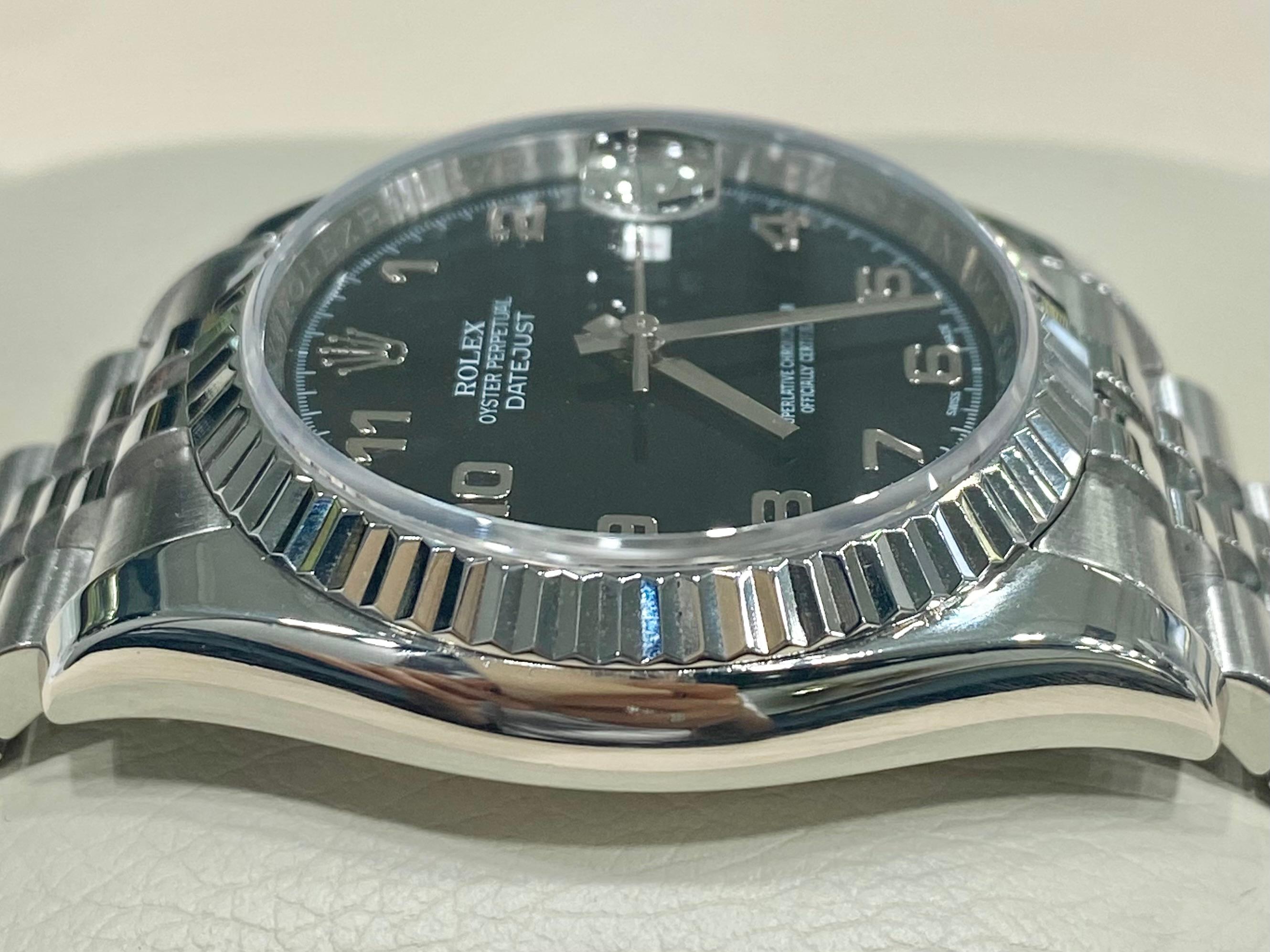 Rolex Datejust Roulette Schwarzes Zifferblatt mit Jubiläumsarmband & geriffelter Lünette 116200 für Damen oder Herren
