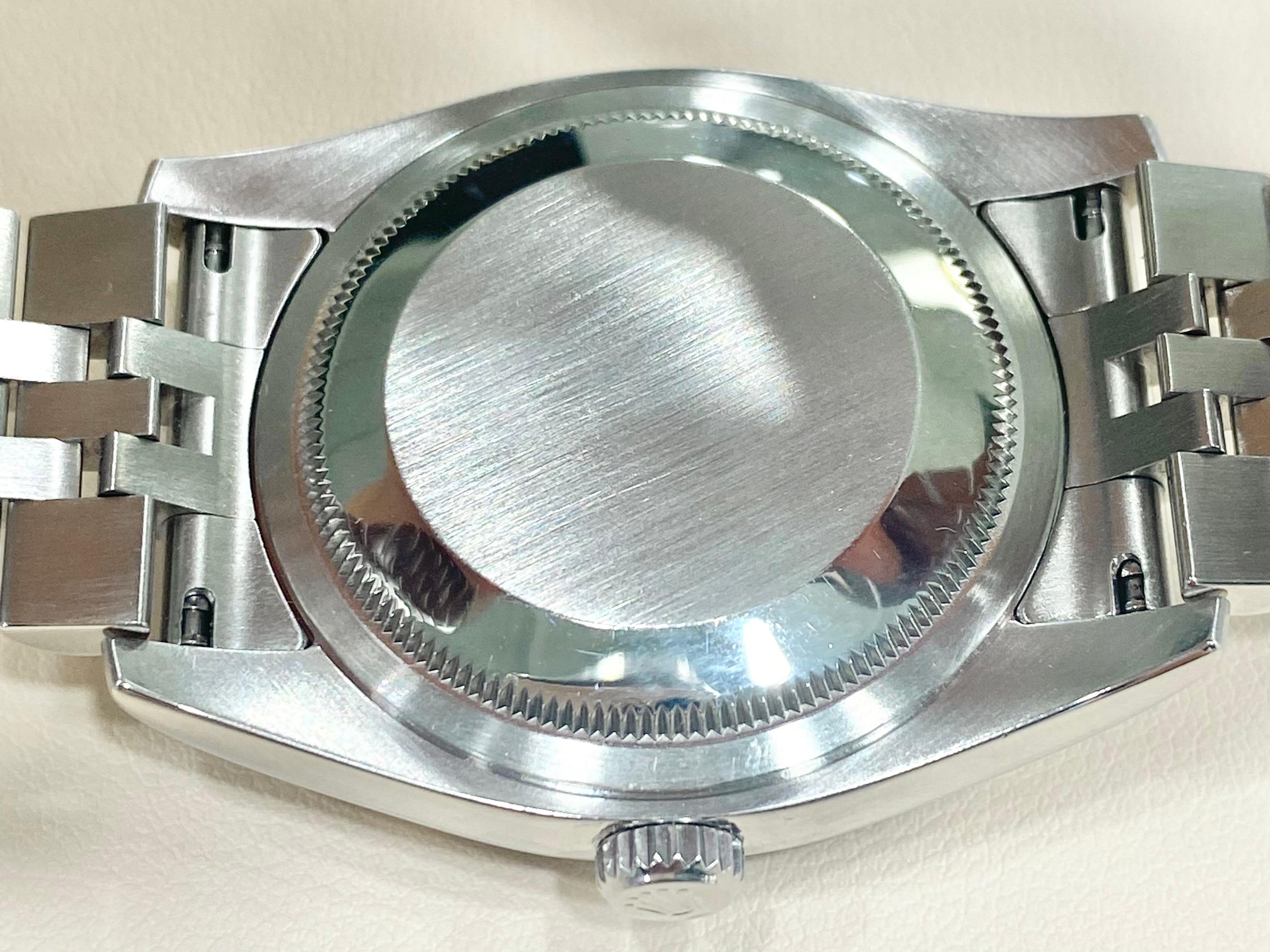 Rolex Datejust Roulette Schwarzes Zifferblatt mit Jubiläumsarmband & geriffelter Lünette 116200 1