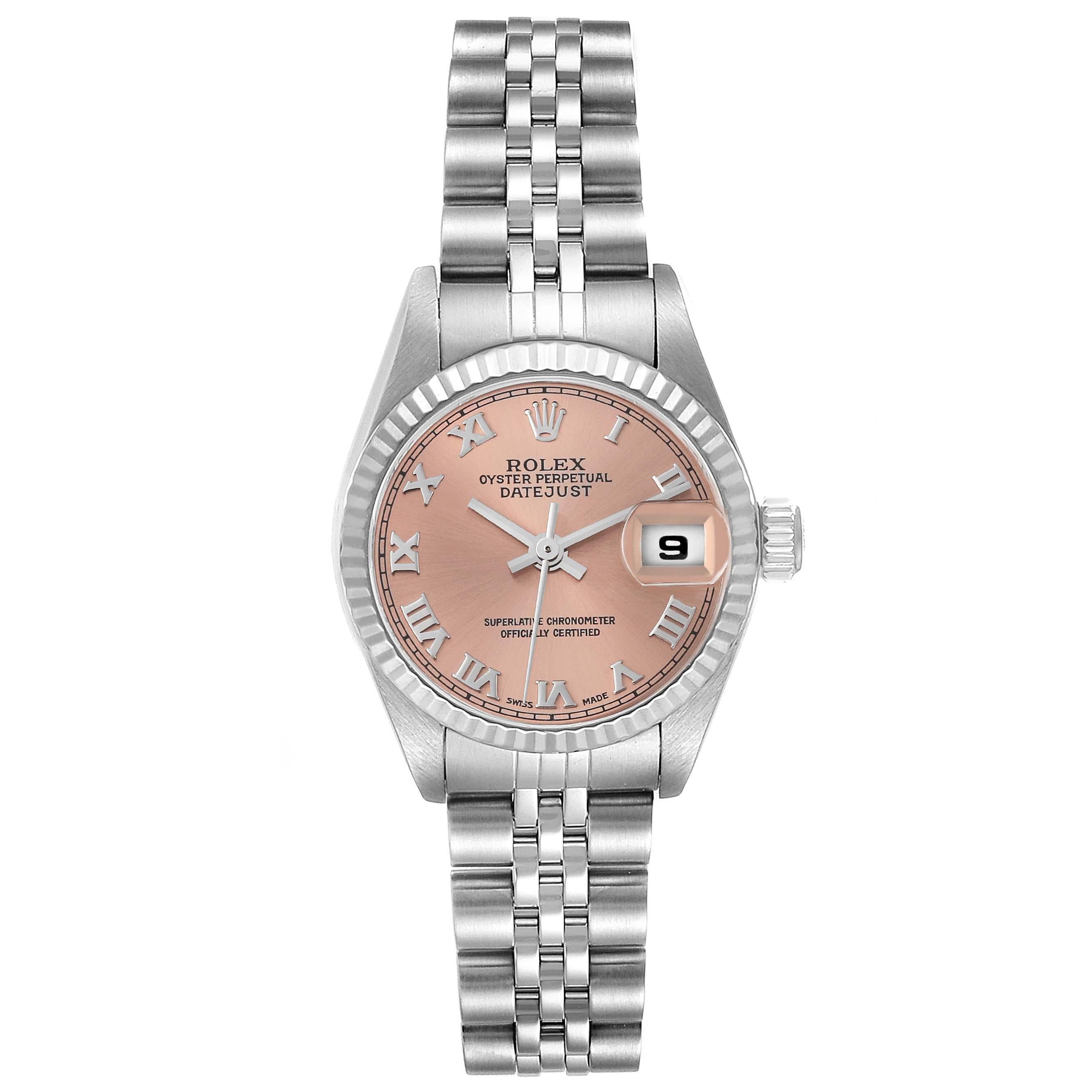Rolex Datejust Salmon Dial White Gold Steel Ladies Watch 79174. Officially certified chronometer automatic self-winding movement. Stainless steel oyster case 26.0 mm in diameter. Rolex logo on the crown. 18K white gold fluted bezel. Scratch