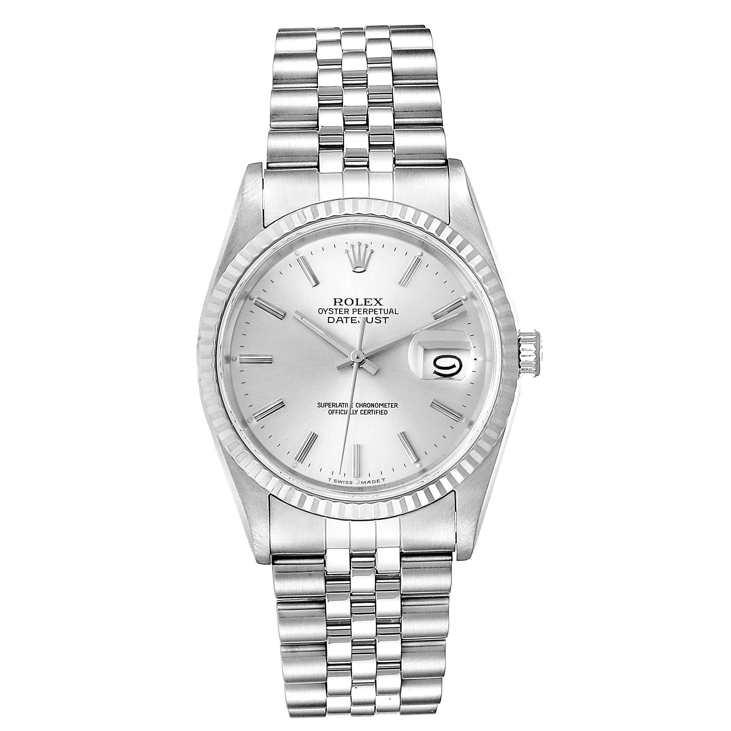 Rolex Datejust Silver Dial Fluted Bezel Steel White Gold Mens Watch 16234. Officially certified chronometer self-winding movement. Stainless steel oyster case 36 mm in diameter. Rolex logo on a crown. 18k white gold fluted bezel. Scratch resistant