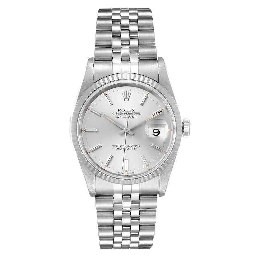 Rolex Datejust Silver Dial Fluted Bezel Steel White Gold Mens Watch 16234. Officially certified chronometer self-winding movement. Stainless steel oyster case 36 mm in diameter. Rolex logo on a crown. 18k white gold fluted bezel. Scratch resistant