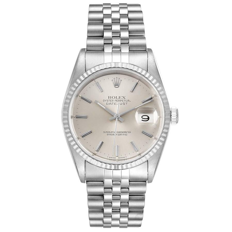 Rolex Datejust Silver Dial Fluted Bezel Steel White Gold Mens Watch 16234. Officially certified chronometer self-winding movement. Stainless steel oyster case 36 mm in diameter. Rolex logo on a crown. 18k white gold fluted bezel. Scratch resistant