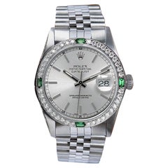 Montre en acier Datejust 31 mm avec cadran argenté et lunette en diamants et émeraudes