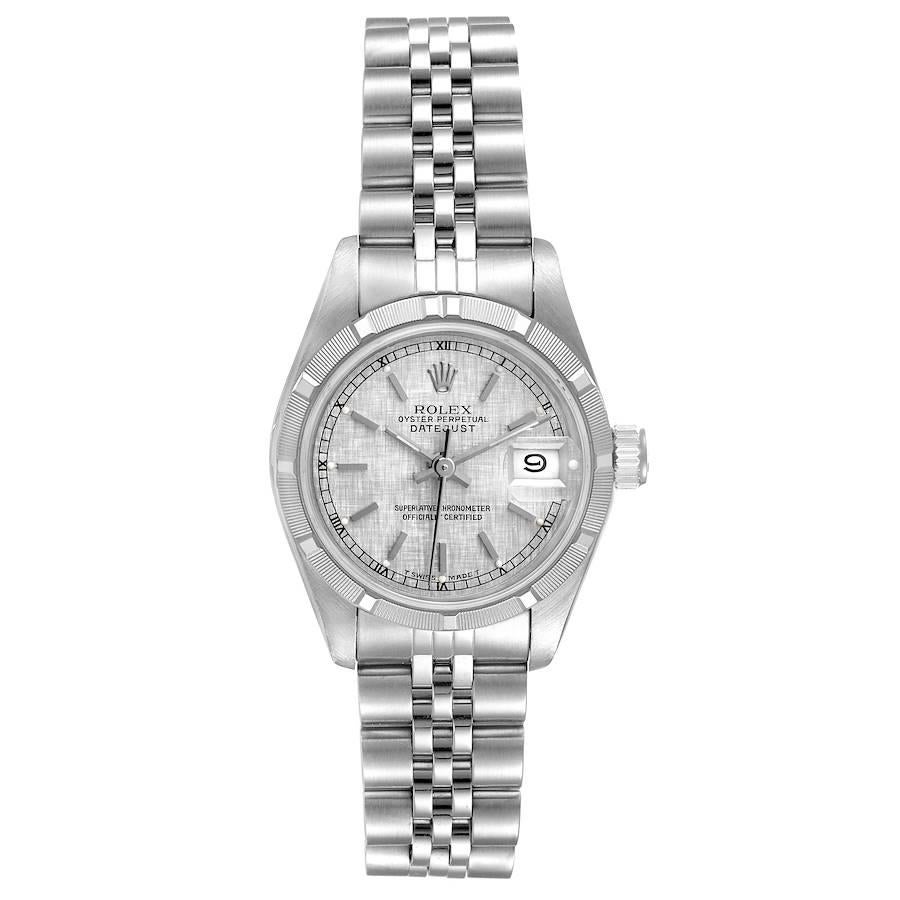 Rolex Datejust Silver Linen Dial Steel Ladies Watch 69160. Officially certified chronometer self-winding movement. Stainless steel oyster case 26.0 mm in diameter. Rolex logo on a crown. Stainless steel engine turned bezel. Scratch resistant
