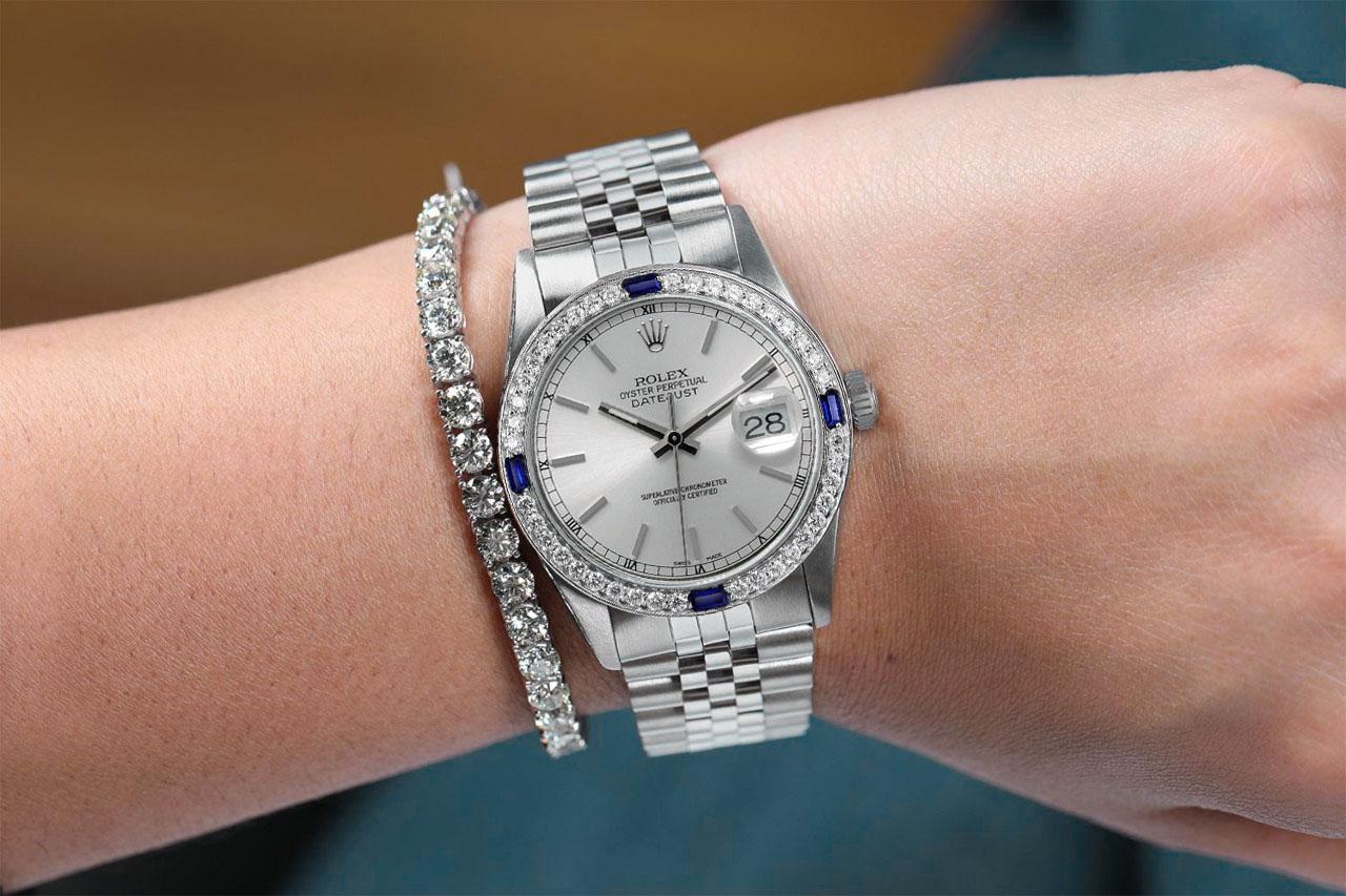 Rolex Datejust Silver Stick Dial Diamond & Blue Sapphire Bezel Steel Watch

We take great pride in presenting this timepiece, which is in impeccable condition, having undergone professional polishing and servicing to maintain its pristine