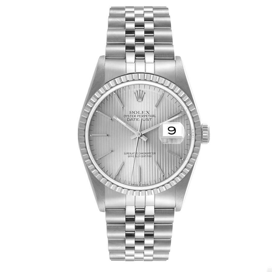 Rolex Datejust Silver Tapestry Dial Engine Turned Bezel Steel Mens Watch 16220. Officially certified chronometer automatic self-winding movement. Stainless steel oyster case 36.0 mm in diameter. Rolex logo on the crown. Stainless steel engine turned