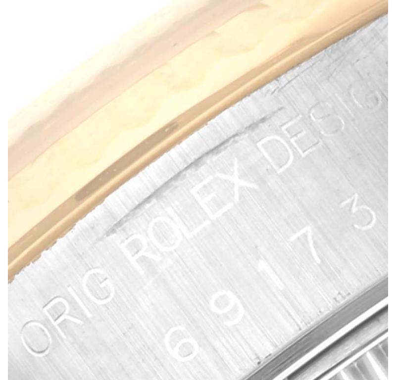 Rolex Datejust Slate Diamond Dial Steel Yellow Gold Ladies Watch 69173 Box Papers. Officially certified chronometer automatic self-winding movement. Stainless steel oyster case 26.0 mm in diameter. Rolex logo on the crown. 18k yellow gold fluted