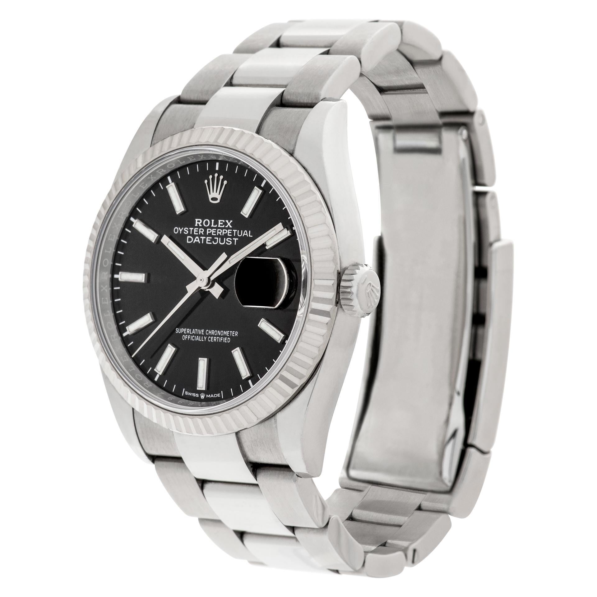 Rolex Datejust in stainless steel with 18k white gold fluted bezel. Auto w/ sweep seconds and date. 36 mm case size.  Ref 126234. Circa 2020s. Fine Pre-owned Rolex Watch.

Certified preowned Classic Rolex Datejust 126234 watch is made out of