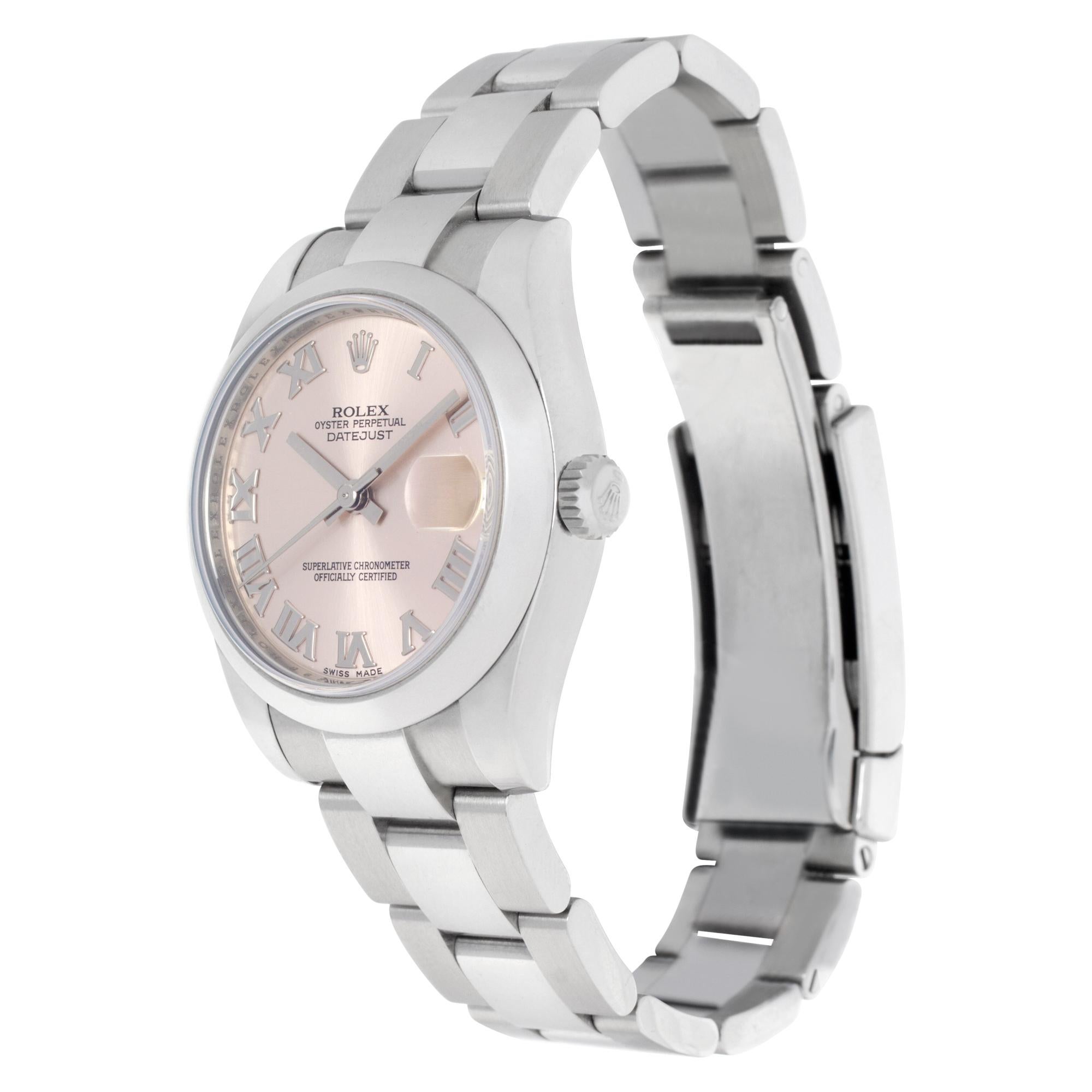 Rolex Datejust in stainless steel with pink dial with white gold applied Roman numeral hour markers. Auto w/ sweep seconds and date. 31 mm case size. With box and papers.  Ref 178240. Circa 2014. Fine Pre-owned Rolex Watch.

Certified preowned
