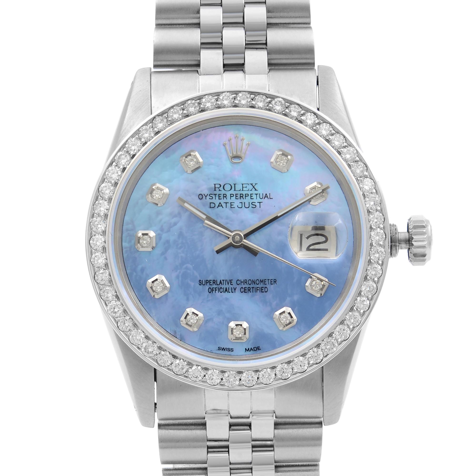 Pre-owned. 1 Cttw Custom Diamond Bezel and 0.20 Custom Diamond Blue Dial. No original box and papers.