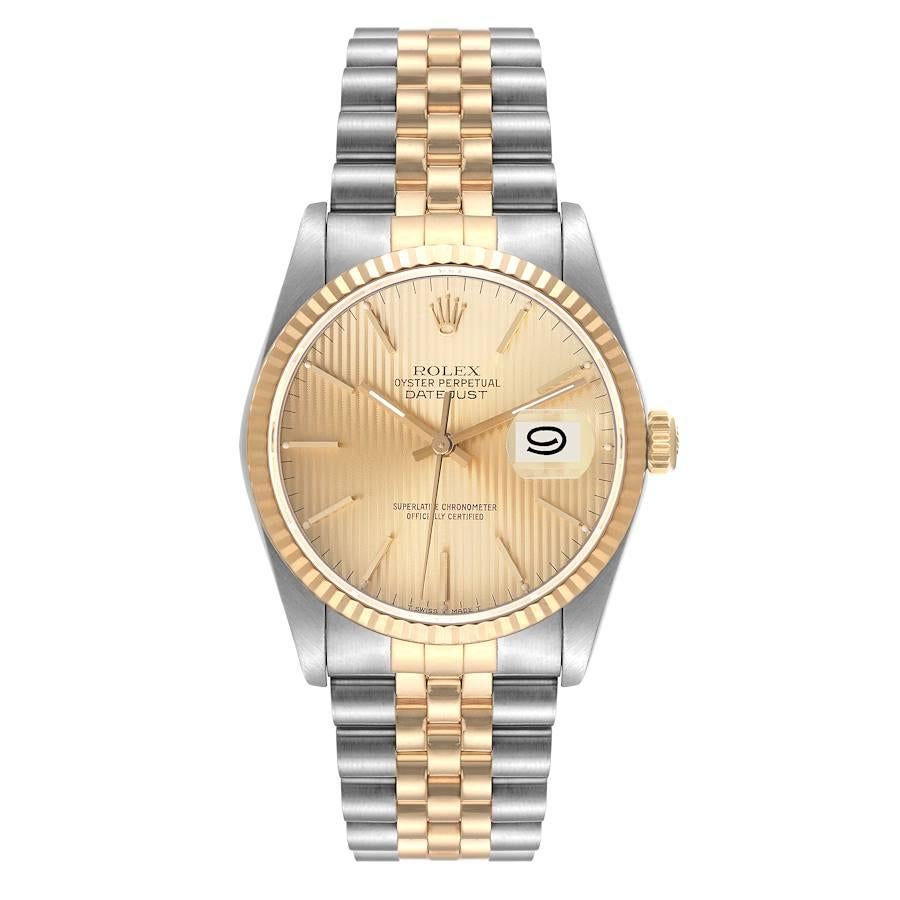 Rolex Datejust Steel 18K Yellow Gold Champagne Tapestry Dial Mens Watch 16233. Officially certified chronometer self-winding movement. Stainless steel case 36 mm in diameter. Rolex logo on an 18K yellow gold crown. 18k yellow gold fluted bezel.