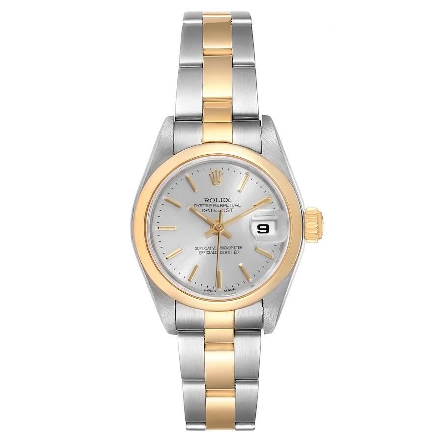 Rolex Datejust Steel 18k Yellow Gold Silver Dial Ladies Watch 79163. Officially certified chronometer self-winding movement. Stainless steel oyster case 26 mm in diameter. Rolex logo on a 18k yellow gold crown. 18k yellow gold smooth domed bezel.