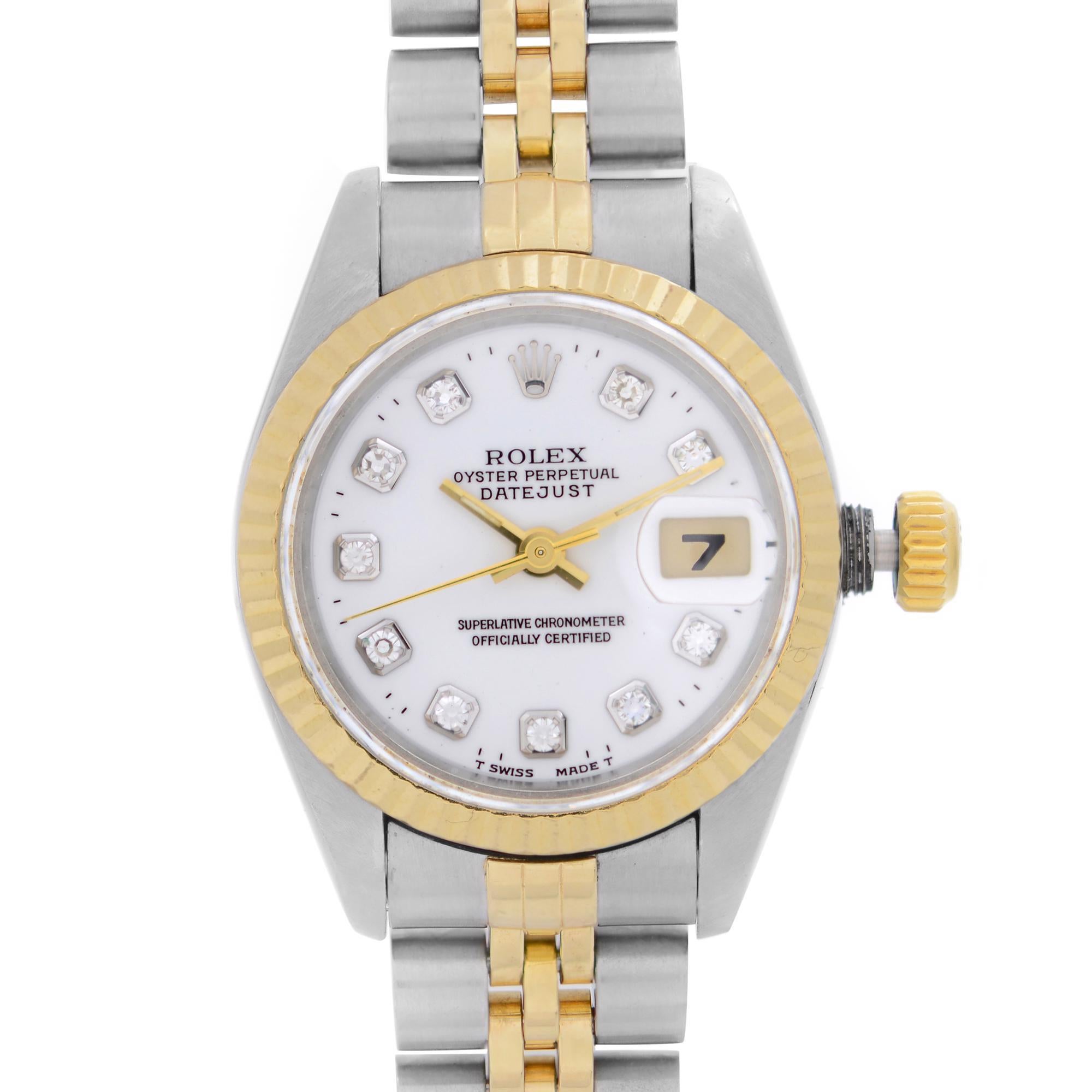Pre-owned Rolex Datejust Steel 18k Yellow Gold White Diamond Dial Ladies Watch 79173. Band Has Minor slack. Factory Diamond Dial. No holes Case. This Beautiful Timepiece Was Produced in 2002 & is Powered by Mechanical (Automatic) Movement And