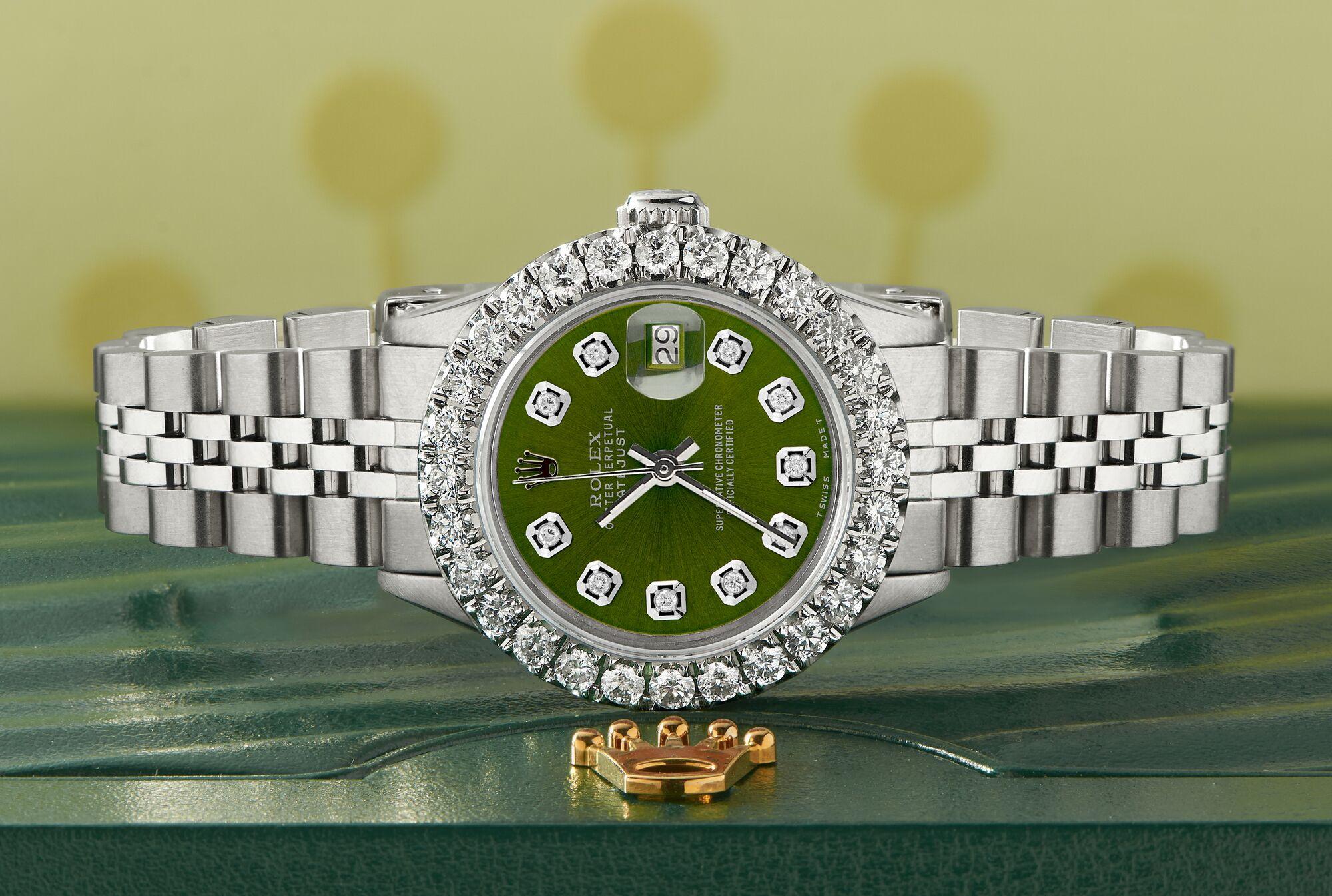 Rolex Datejust Steel Ladies Watch. Self-winding Rolex automatic movement. Stainless steel case 26mm in diameter. Custom 2.0ct diamond bezel. Screw-down crown. Scratch-resistant sapphire crystal. Custom royal green diamond dial. Factory stainless
