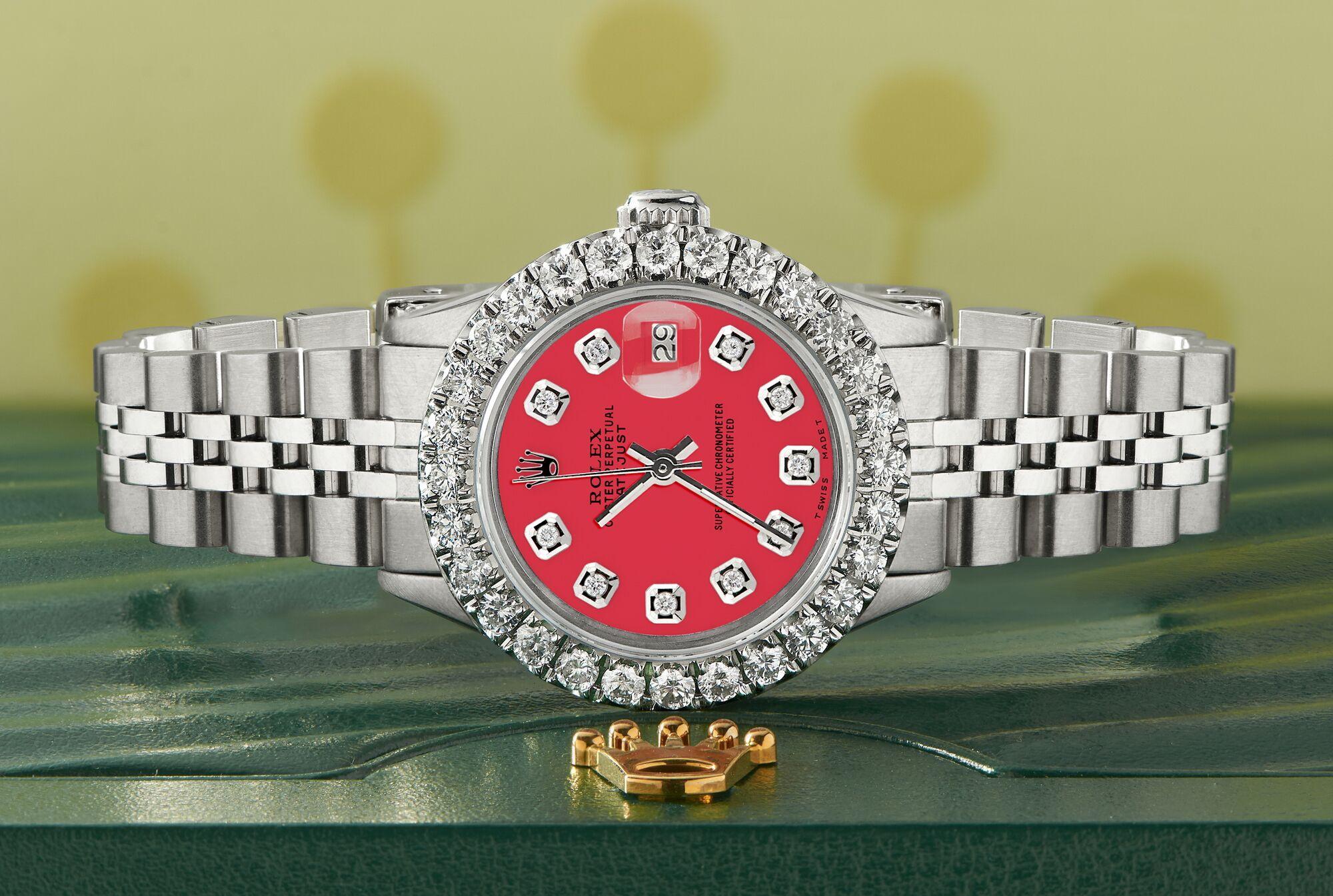 Rolex Datejust Steel Ladies Watch. Self-winding Rolex automatic movement. Stainless steel case 26mm in diameter. Custom 2.0ct diamond bezel. Screw-down crown. Scratch-resistant sapphire crystal. Custom scarlet red MOP diamond dial. Factory stainless