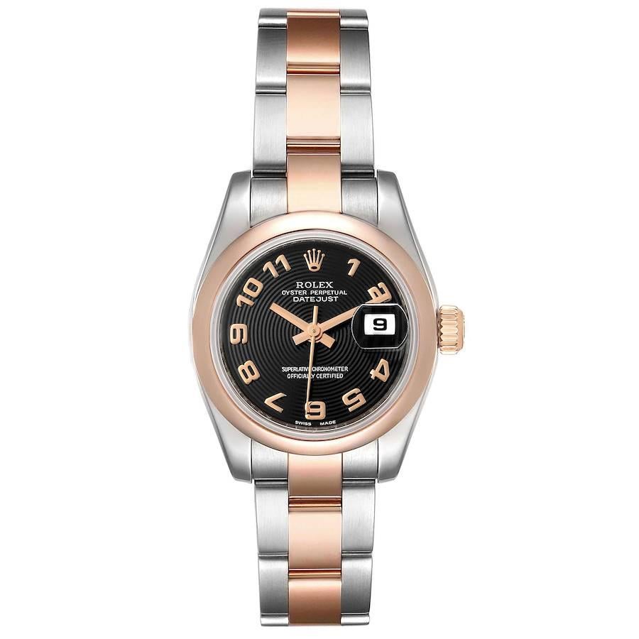 Rolex Datejust Steel Rose Gold Black Concentric Dial Ladies Watch 179161. Officially certified chronometer self-winding movement. Stainless steel oyster case 26.0 mm in diameter. Rolex logo on a 18K rose gold crown. 18k rose gold smooth domed bezel.
