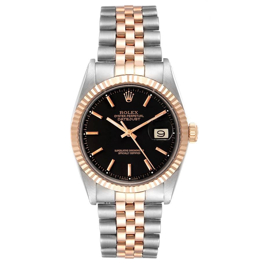 Rolex Datejust Steel Rose Gold Black Dial Vintage Mens Watch 1601. Officially certified chronometer automatic self-winding movement. Stainless steel case 36 mm in diameter. Rolex logo on a crown. Rose gold fluted bezel. Acrylic crystal with cyclops