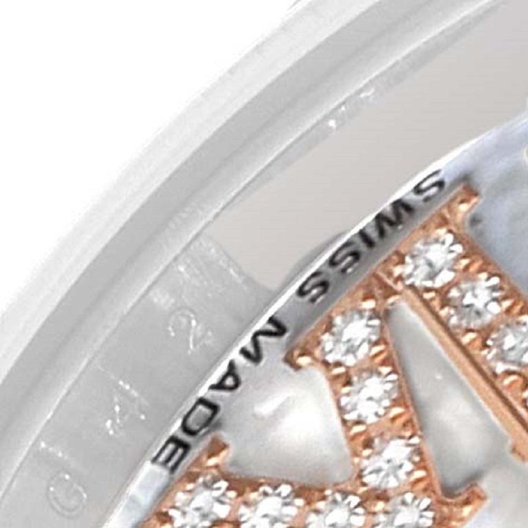 Rolex Datejust Steel Rose Gold Mother of Pearl Diamond Dial Ladies Watch 179171. Officially certified chronometer automatic self-winding movement. Stainless steel oyster case 26.0 mm in diameter. Rolex logo on an 18K rose gold crown. 18k rose gold