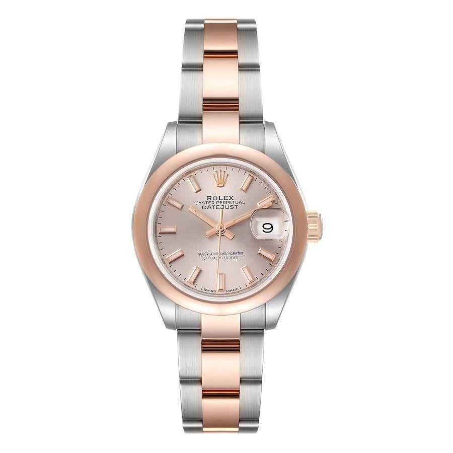 Rolex Datejust Steel Rose Gold Rose Dial Ladies Watch 279161 Box Card. Officially certified chronometer self-winding movement. Stainless steel oyster case 28 mm in diameter. Rolex logo on a 18K rose gold crown. 18k everose gold smooth domed bezel.