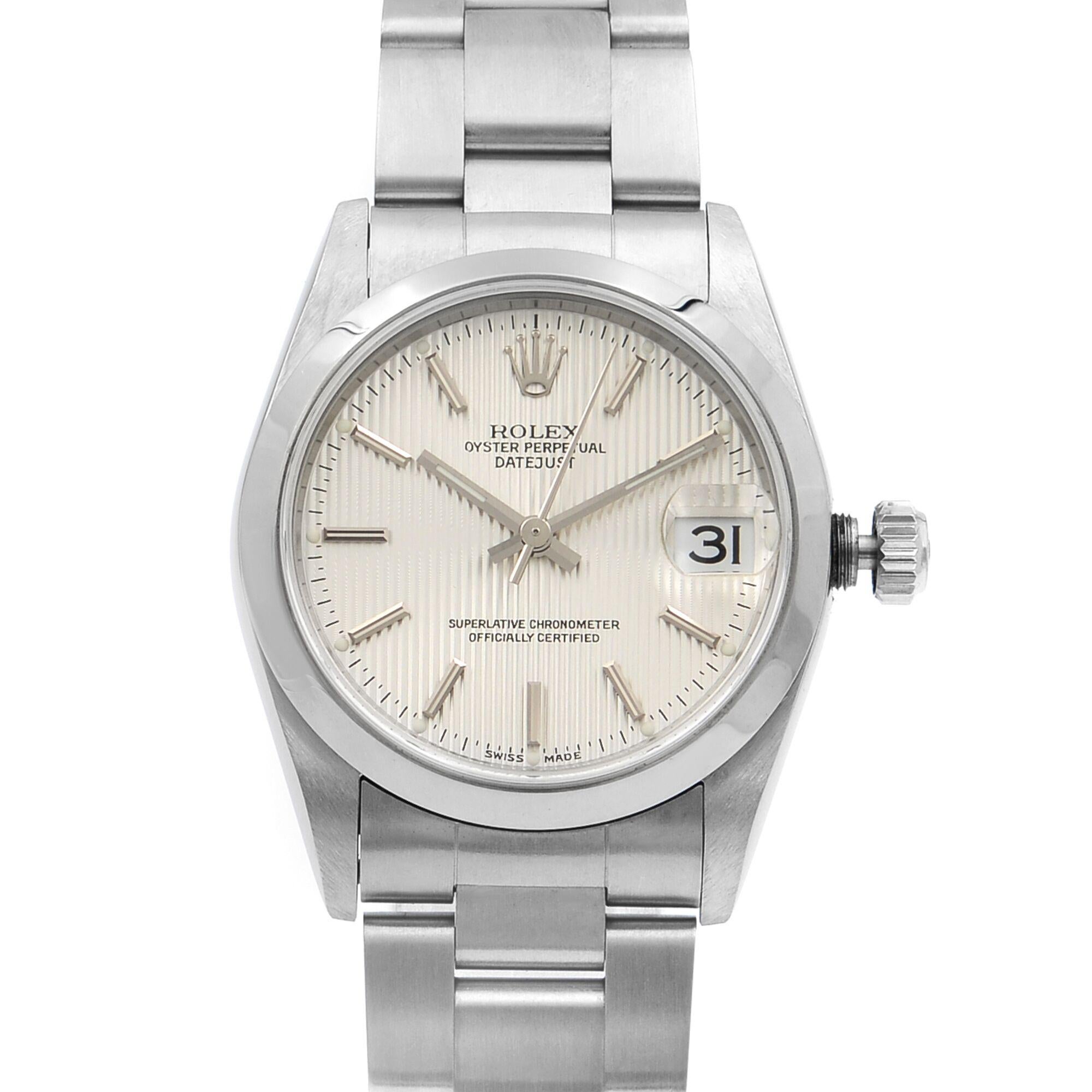 This pre-owned Rolex Datejust 78240 is a beautiful Ladie's timepiece that is powered by a mechanical (automatic) movement which is cased in a stainless steel case. It has a round shape face, date indicator dial, and has hand sticks style markers. It