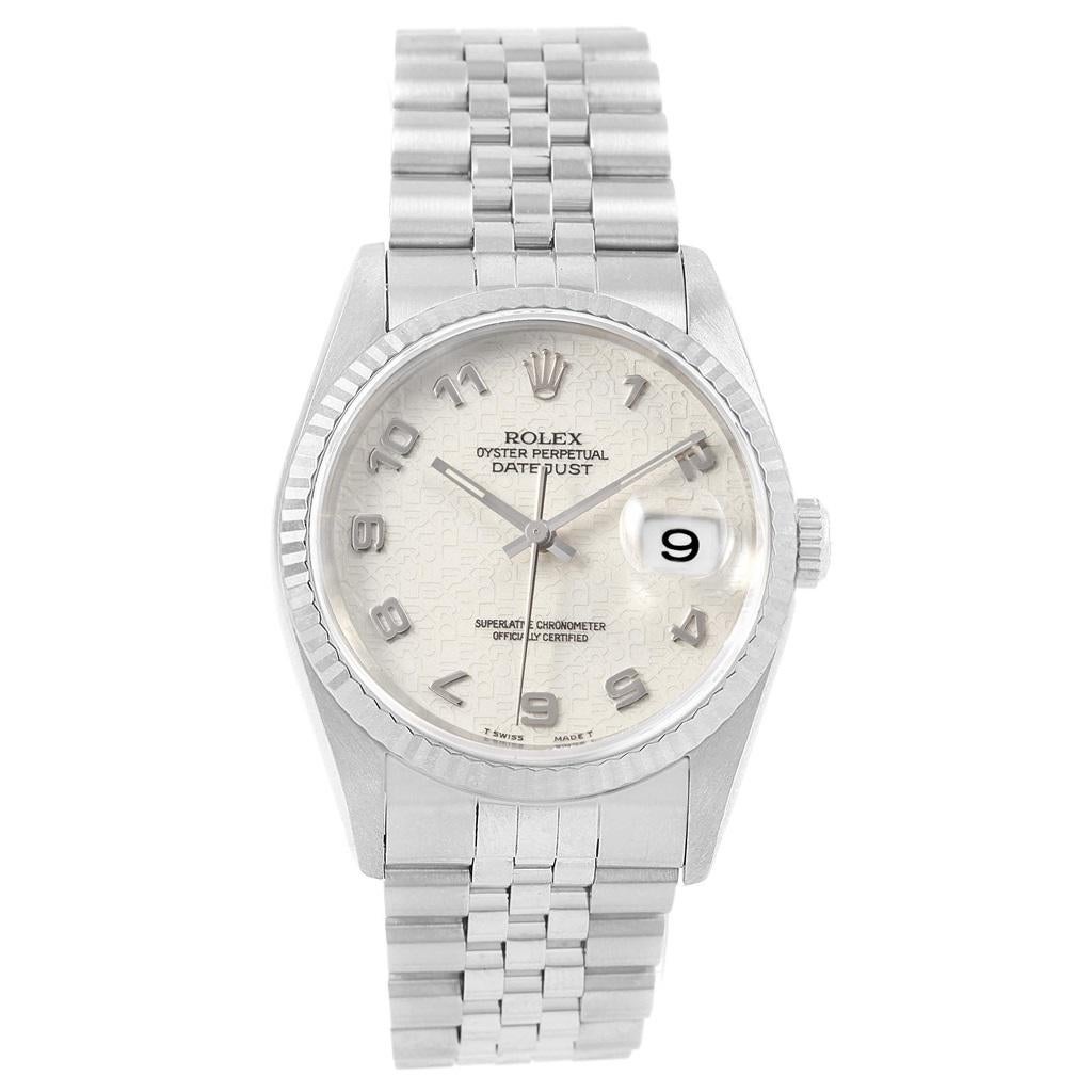 Rolex Datejust Steel White Gold Anniversary Arabic Dial Watch 16234. Officially certified chronometer self-winding movement with quickset date function. Stainless steel oyster case 36.0 mm in diameter. Rolex logo on a crown. 18k white gold fluted