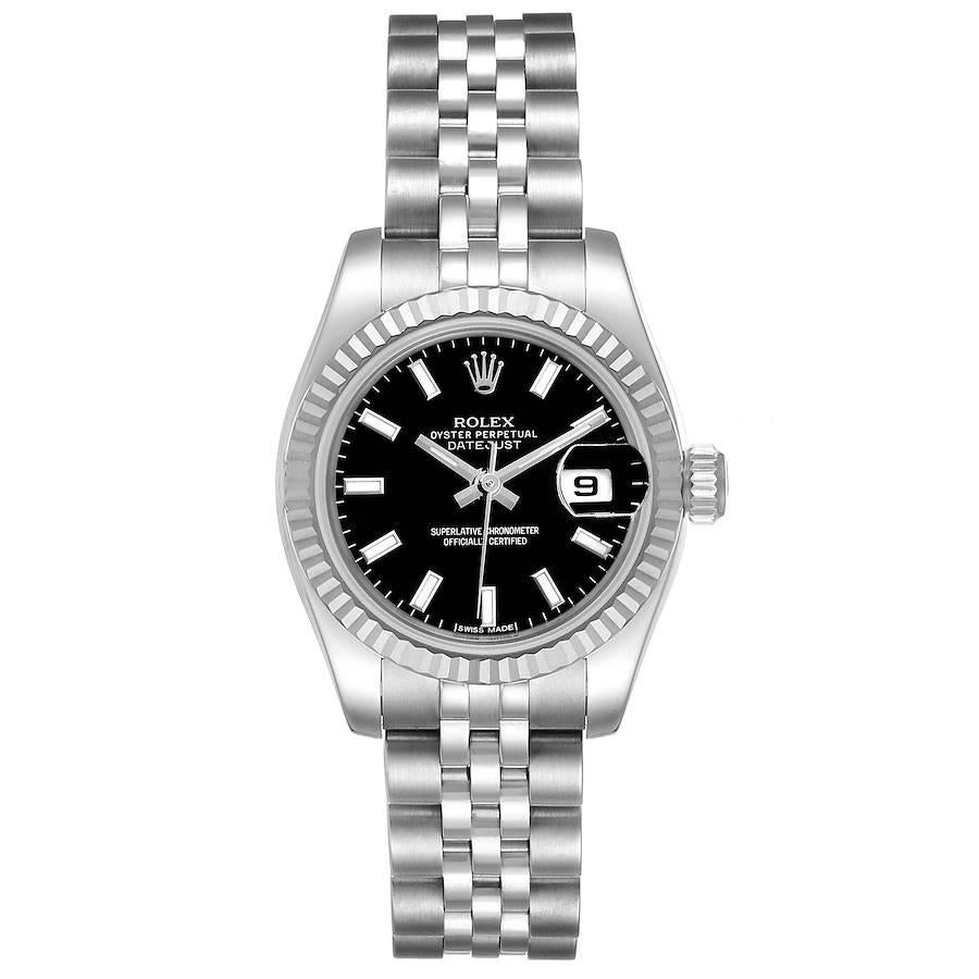 Rolex Datejust Steel White Gold Black Dial Ladies Watch 179174. Officially certified chronometer self-winding movement. Stainless steel oyster case 26.0 mm in diameter. Rolex logo on a crown. 18K white gold fluted bezel. Scratch resistant sapphire