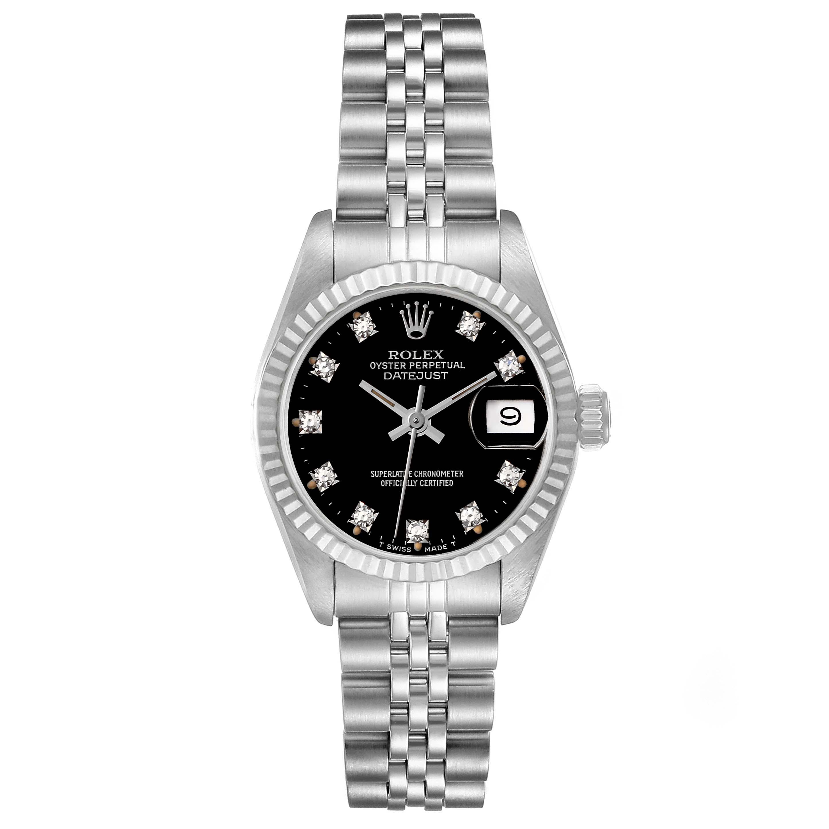 Rolex Datejust Steel White Gold Black Diamond Dial Ladies Watch 69174 Box Papers. Officially certified chronometer automatic self-winding movement. Stainless steel oyster case 26.0 mm in diameter. Rolex logo on a crown. 18k white gold fluted bezel.