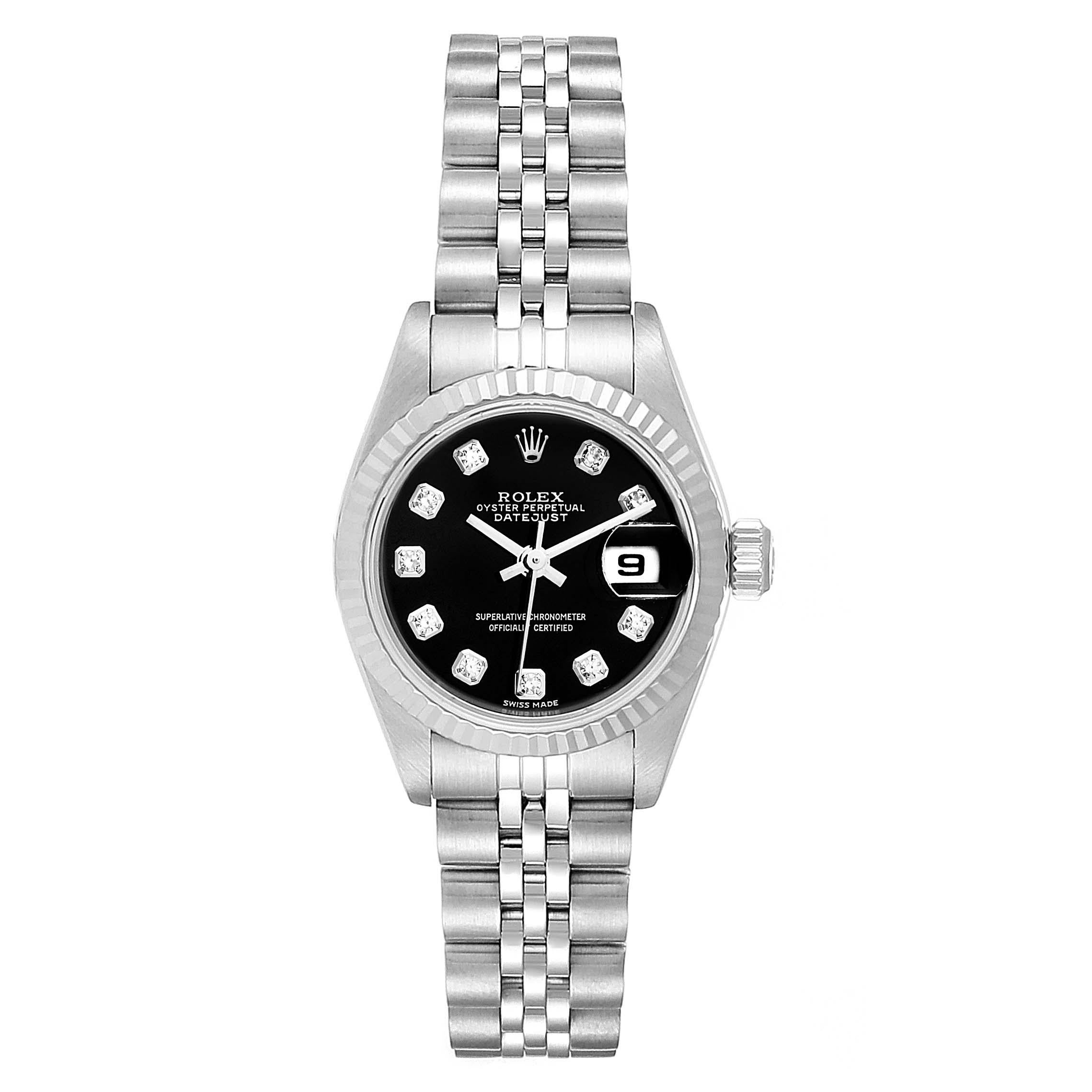 Rolex Datejust Steel White Gold Black Diamond Dial Ladies Watch 79174. Officially certified chronometer self-winding movement. Stainless steel oyster case 26.0 mm in diameter. Rolex logo on a crown. 18k white gold fluted bezel. Scratch resistant