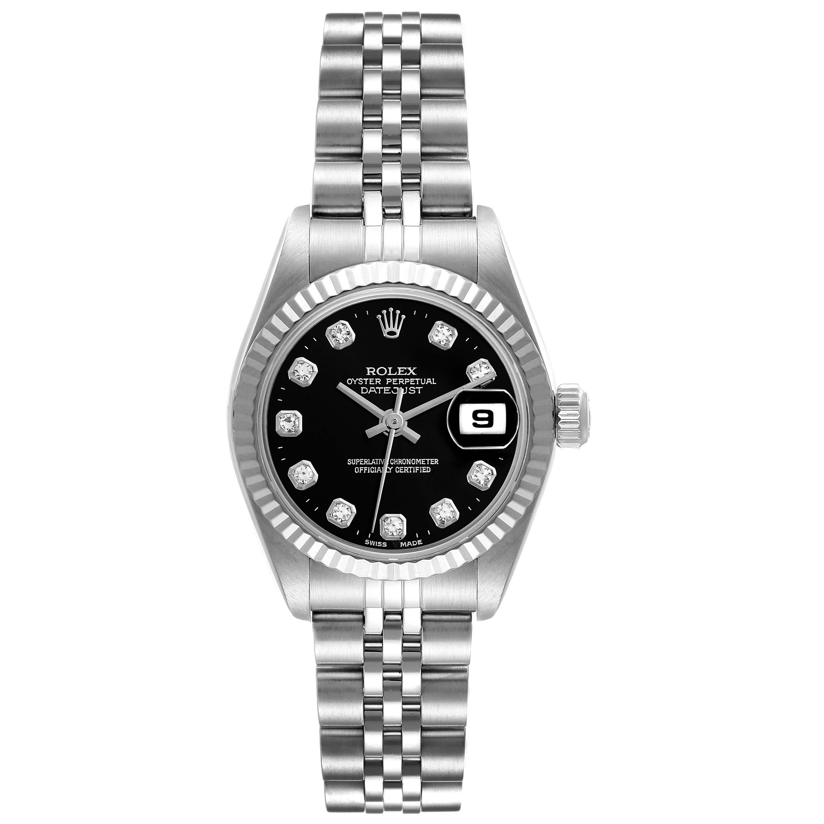 Rolex Datejust Steel White Gold Black Diamond Dial Ladies Watch 79174. Officially certified chronometer automatic self-winding movement. Stainless steel oyster case 26.0 mm in diameter. Rolex logo on a crown. 18k white gold fluted bezel. Scratch