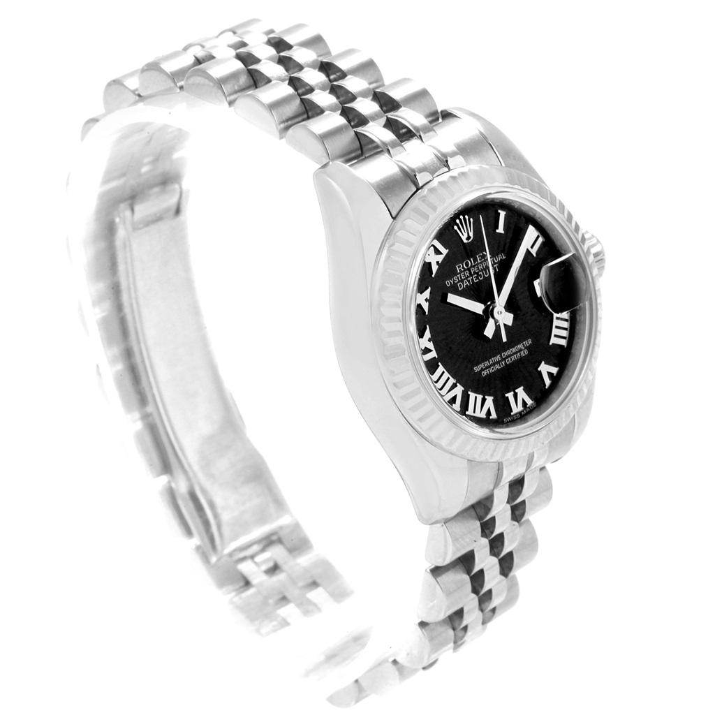 Rolex Datejust Steel White Gold Black Sunbeam Dial Ladies Watch 179174. Officially certified chronometer automatic self-winding movement. Stainless steel oyster case 26.0 mm in diameter. Rolex logo on a crown. 18K white gold fluted bezel. Scratch