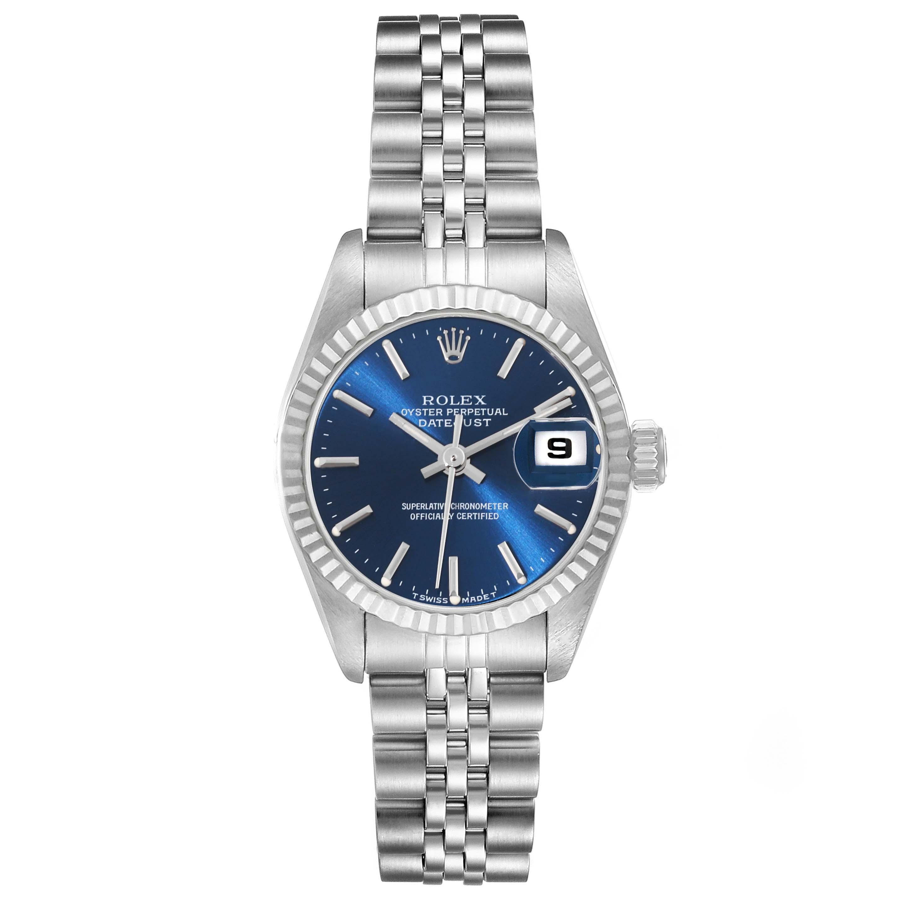 Rolex Datejust Steel White Gold Blue Dial Ladies Watch 69174 Box Papers. Officially certified chronometer automatic self-winding movement. Stainless steel oyster case 26 mm in diameter. Rolex logo on a crown. 18k white gold fluted bezel. Scratch